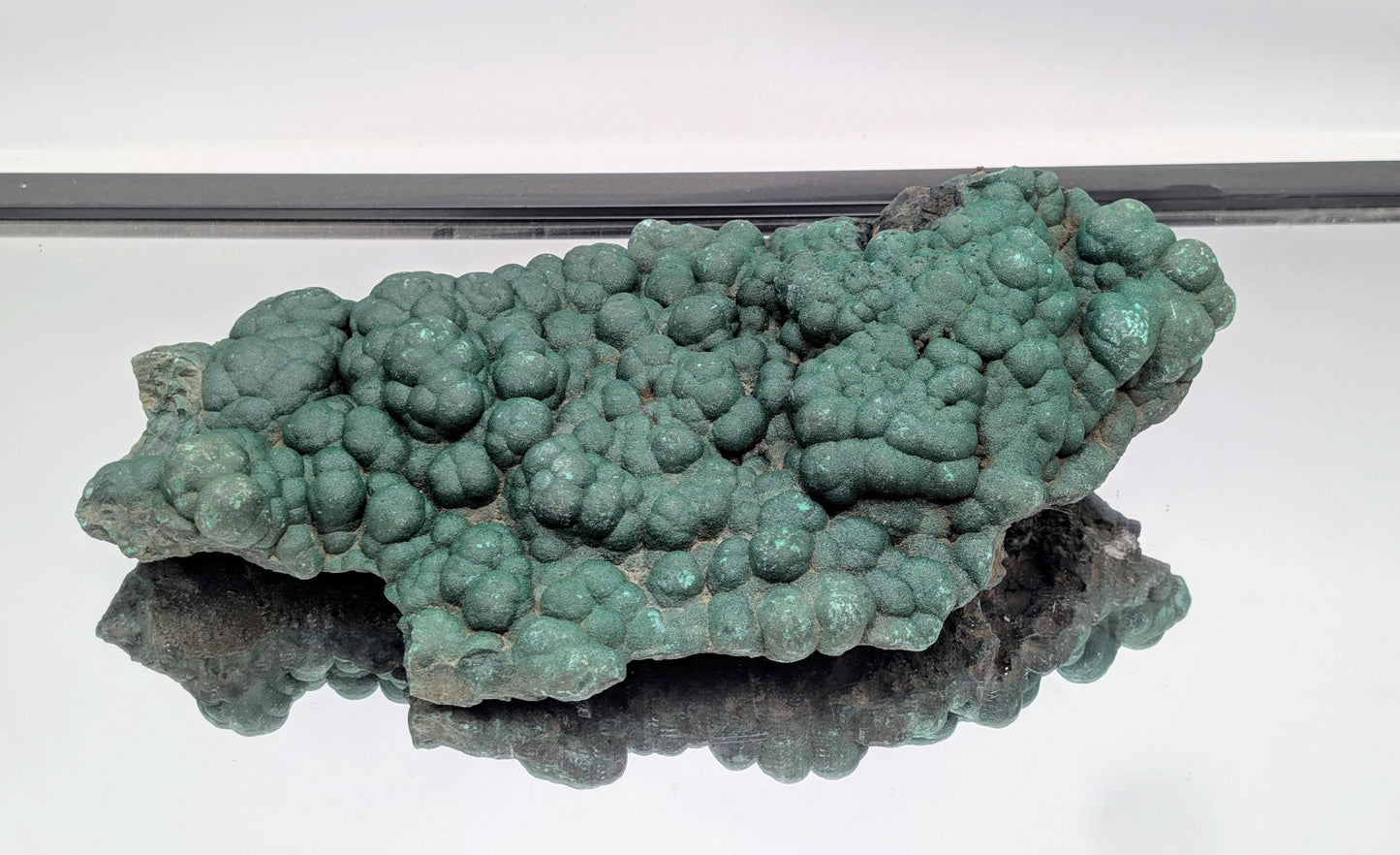 Decorative malachite piece with sparkling quartz druzy.