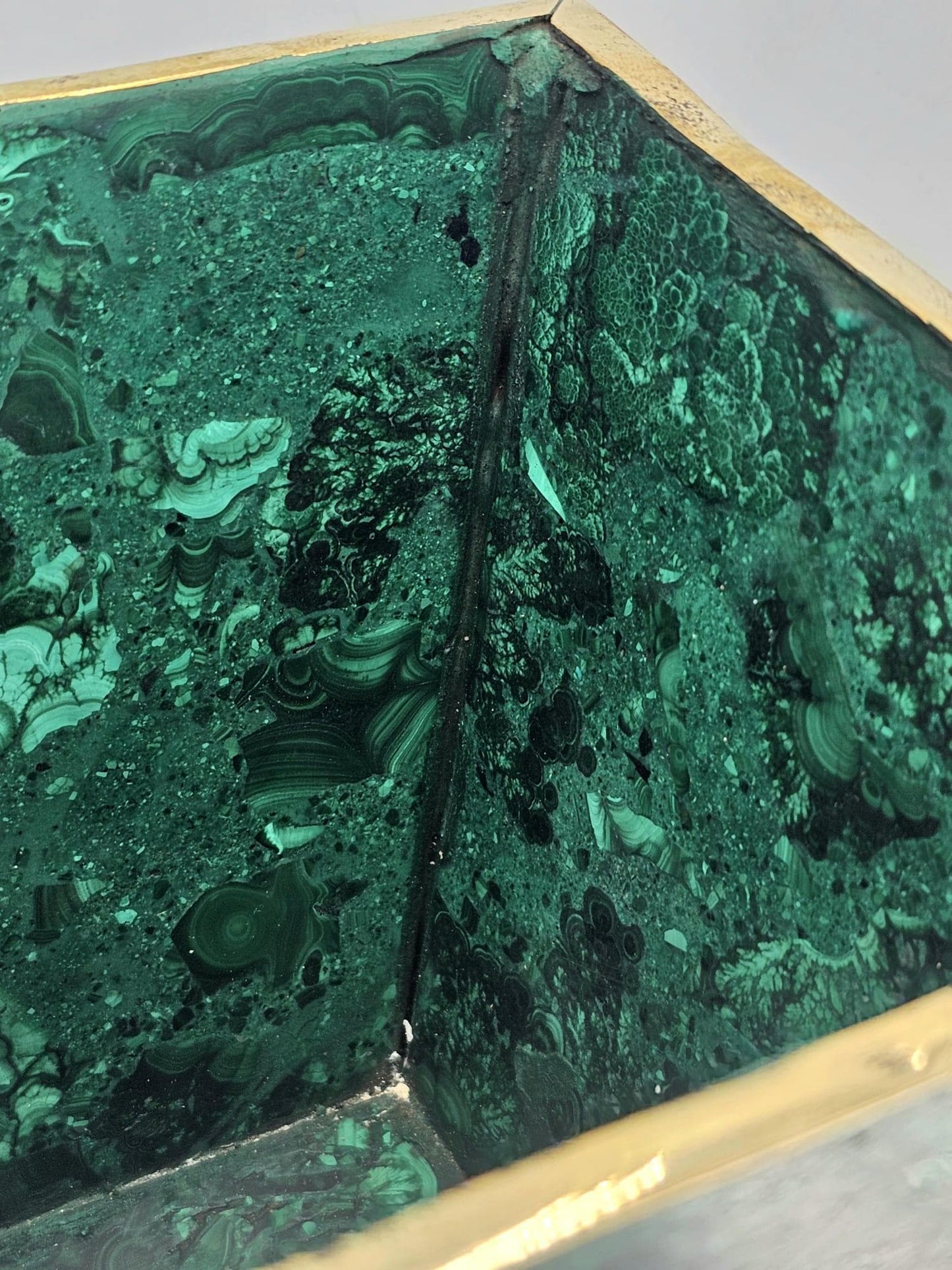 Unique green malachite pot, a sophisticated addition to interior design