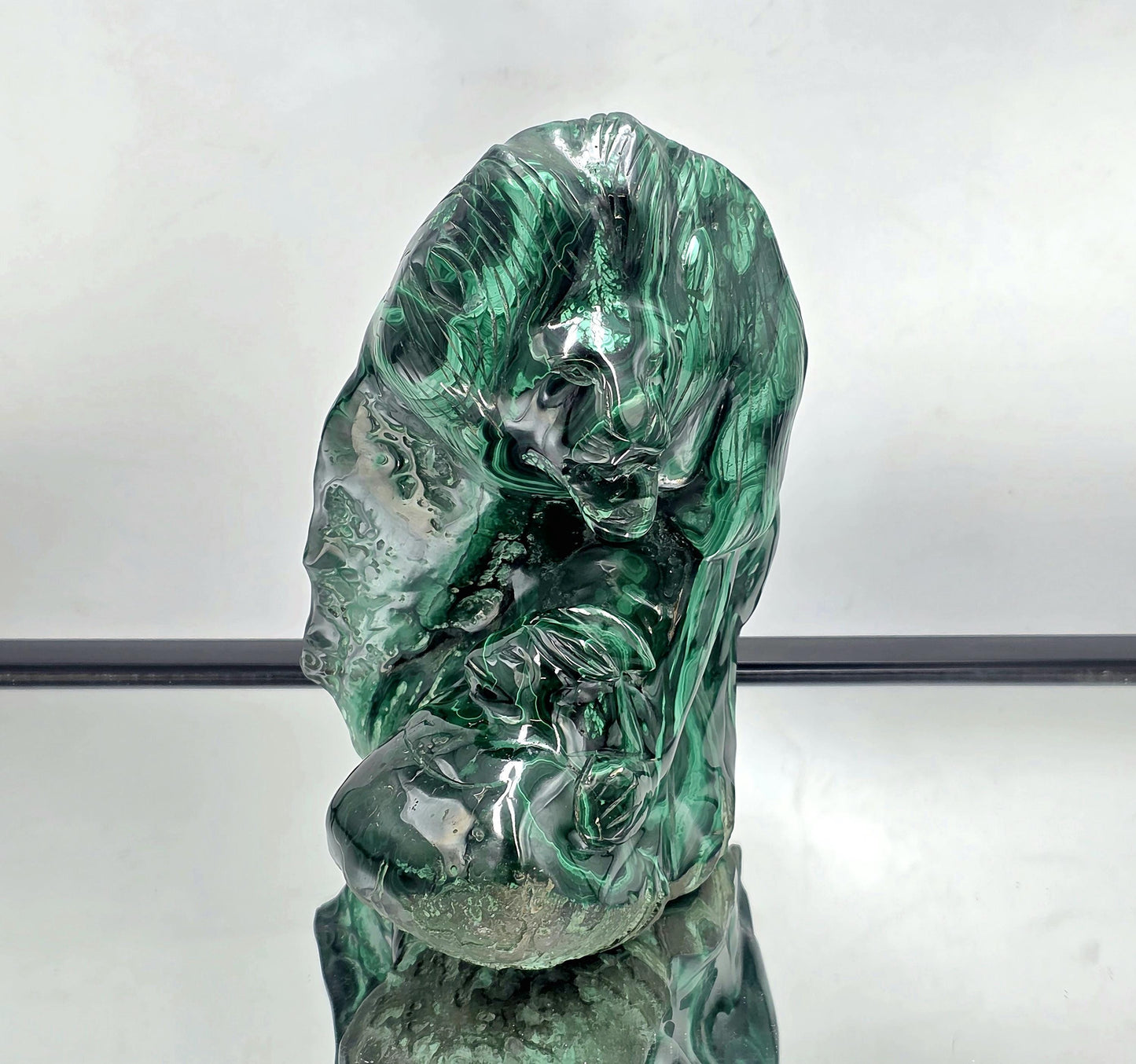 Natural polished Malachite carving.