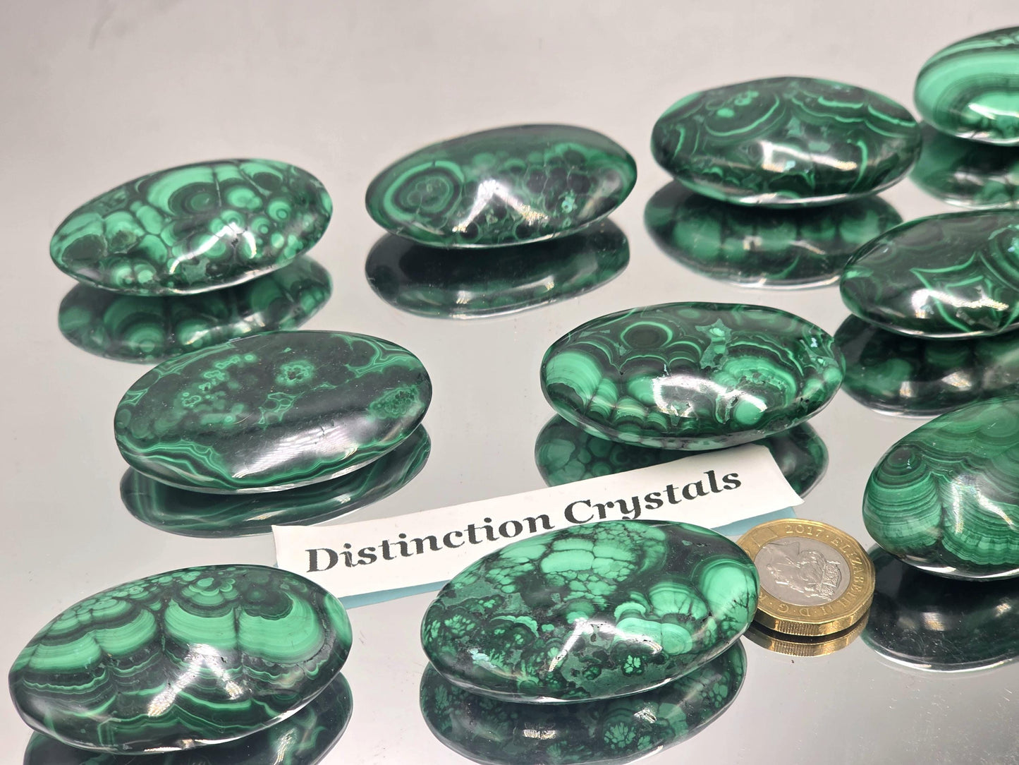 lose-up of intricate natural veining on Malachite palmstone.