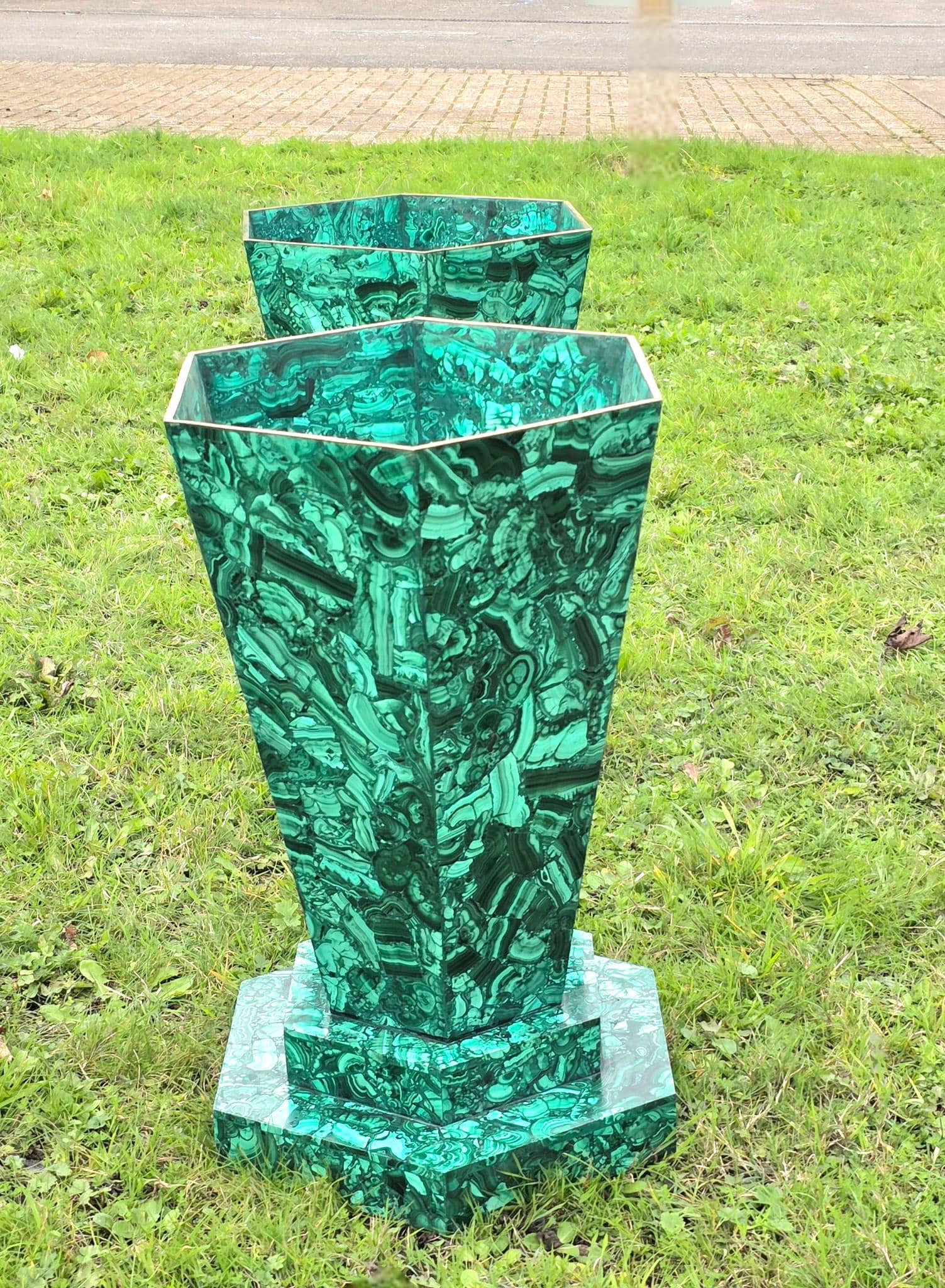 Handcrafted malachite vase with natural green banding for home interiors