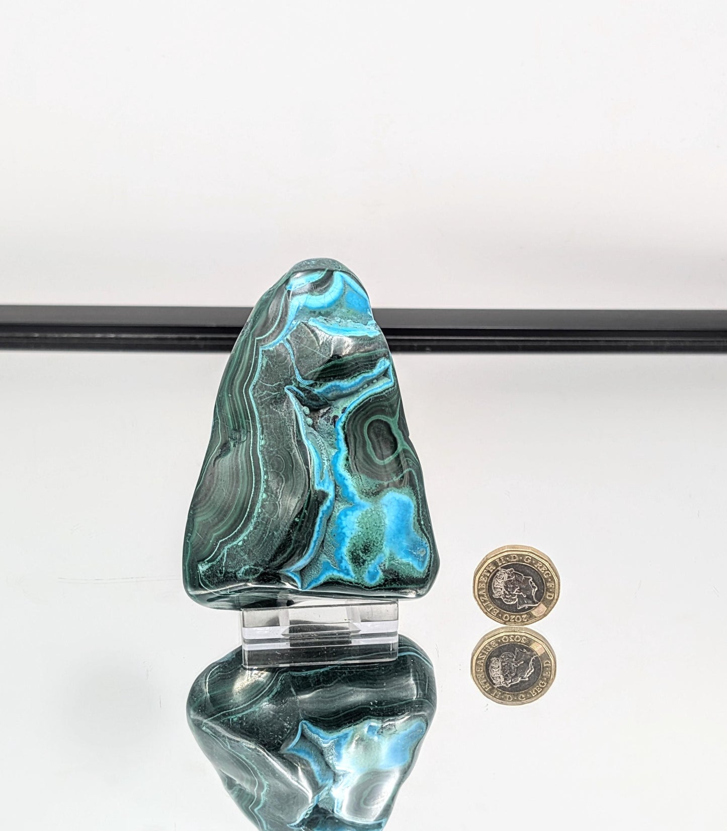Statement Malacolla crystal freeform with polished finish and ocean pattern.