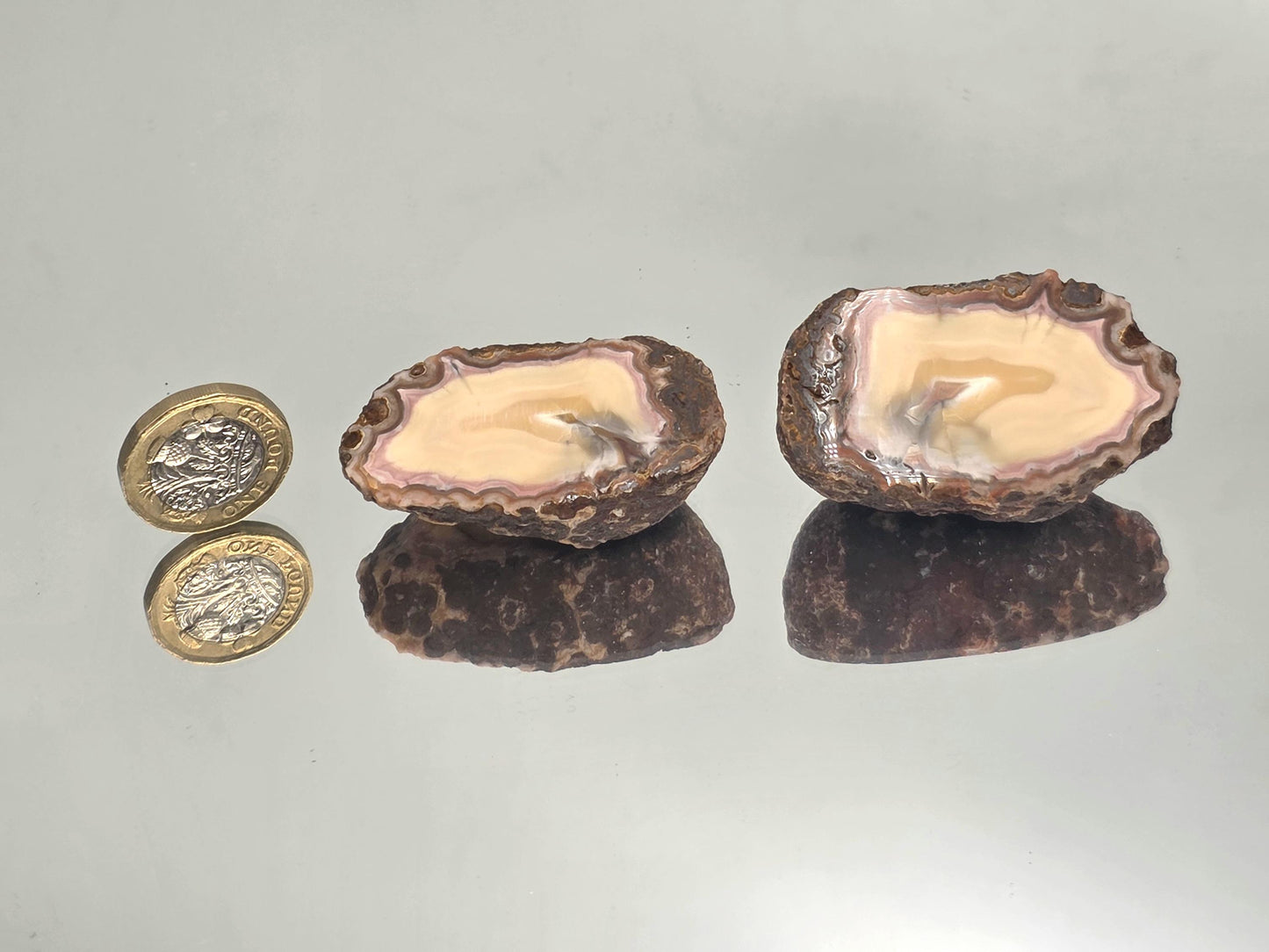 Rare polished Malawi Agate geode pair for collectors.