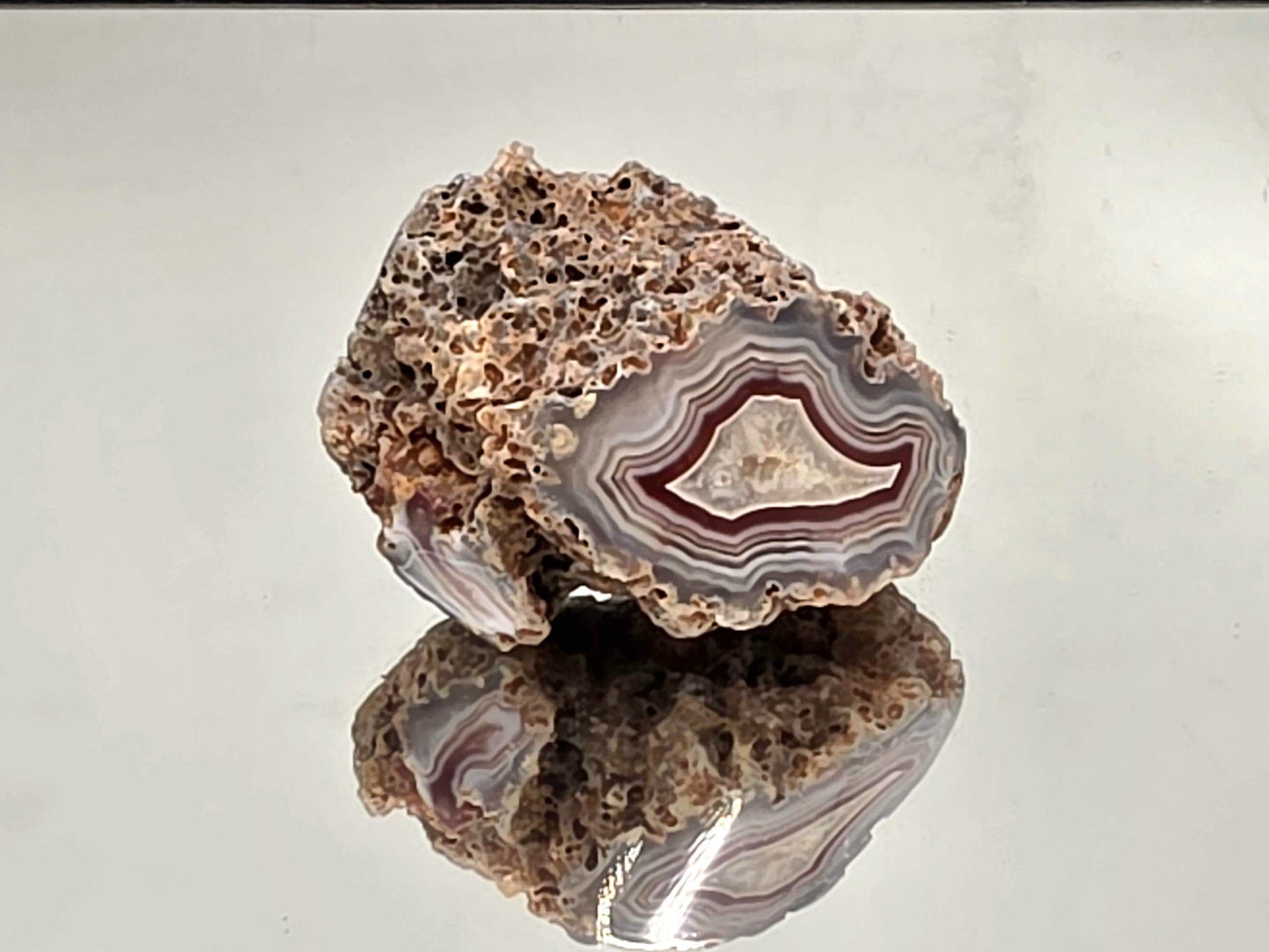 Malawi Agate polished geode with natural colour banding.