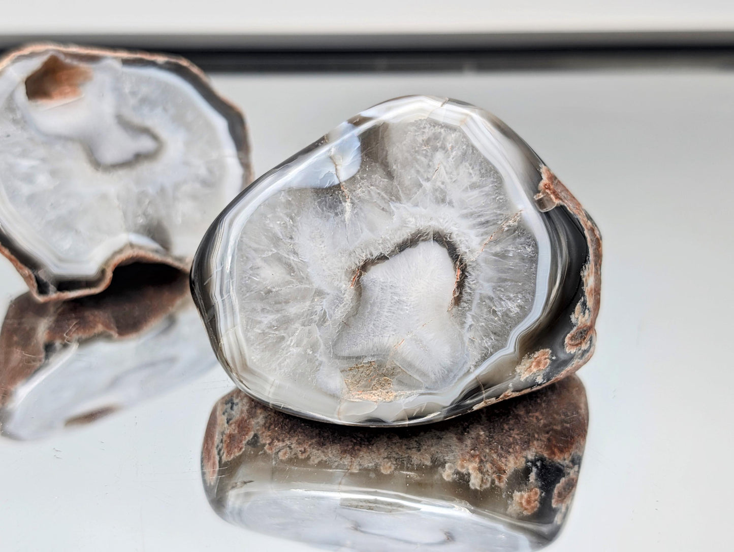 Smoothly polished Malawi Agate pair with unique patterns.