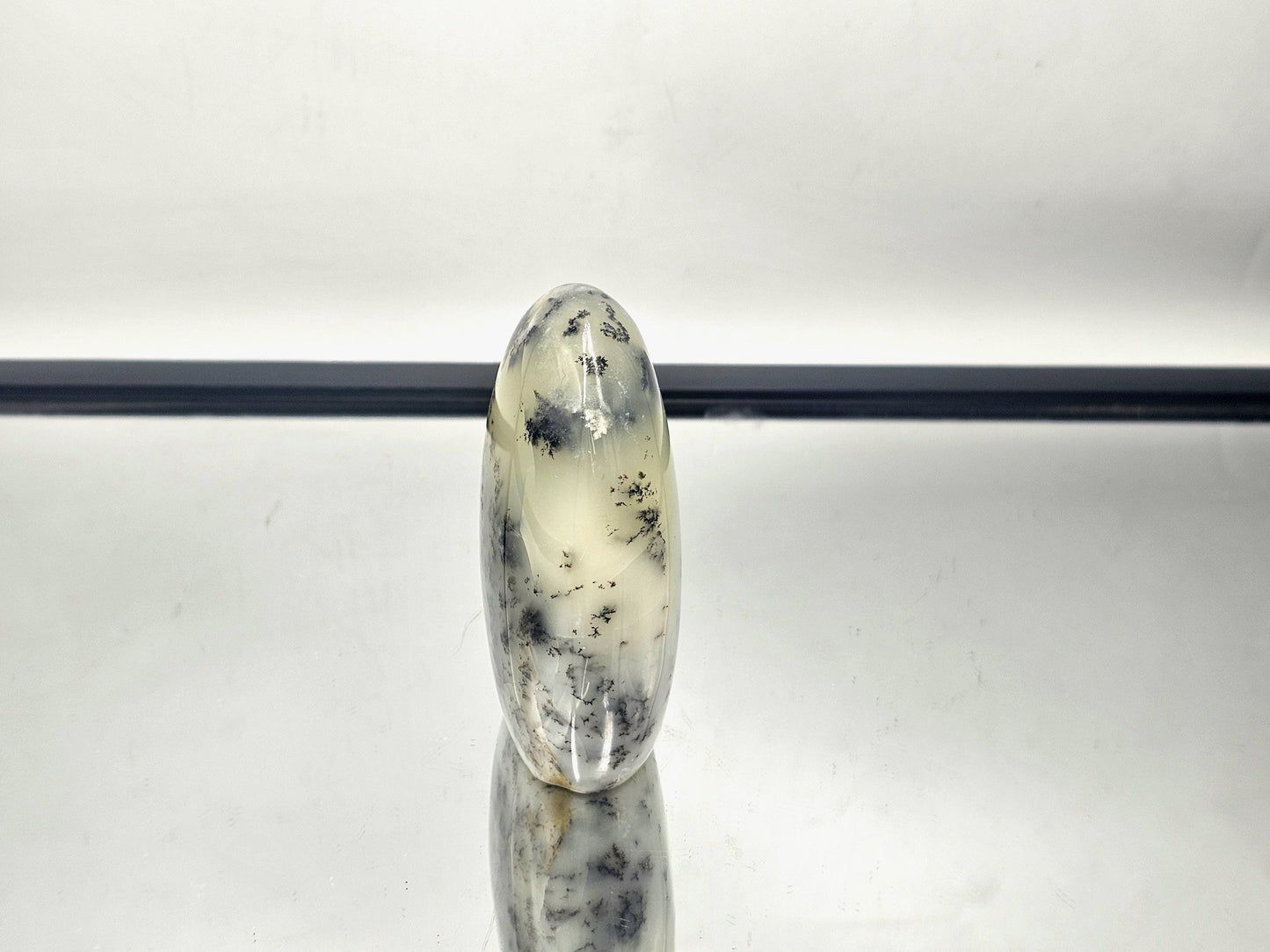 Merlinite Polished Stand-Up with fern-like patterns, sourced from Madagascar.