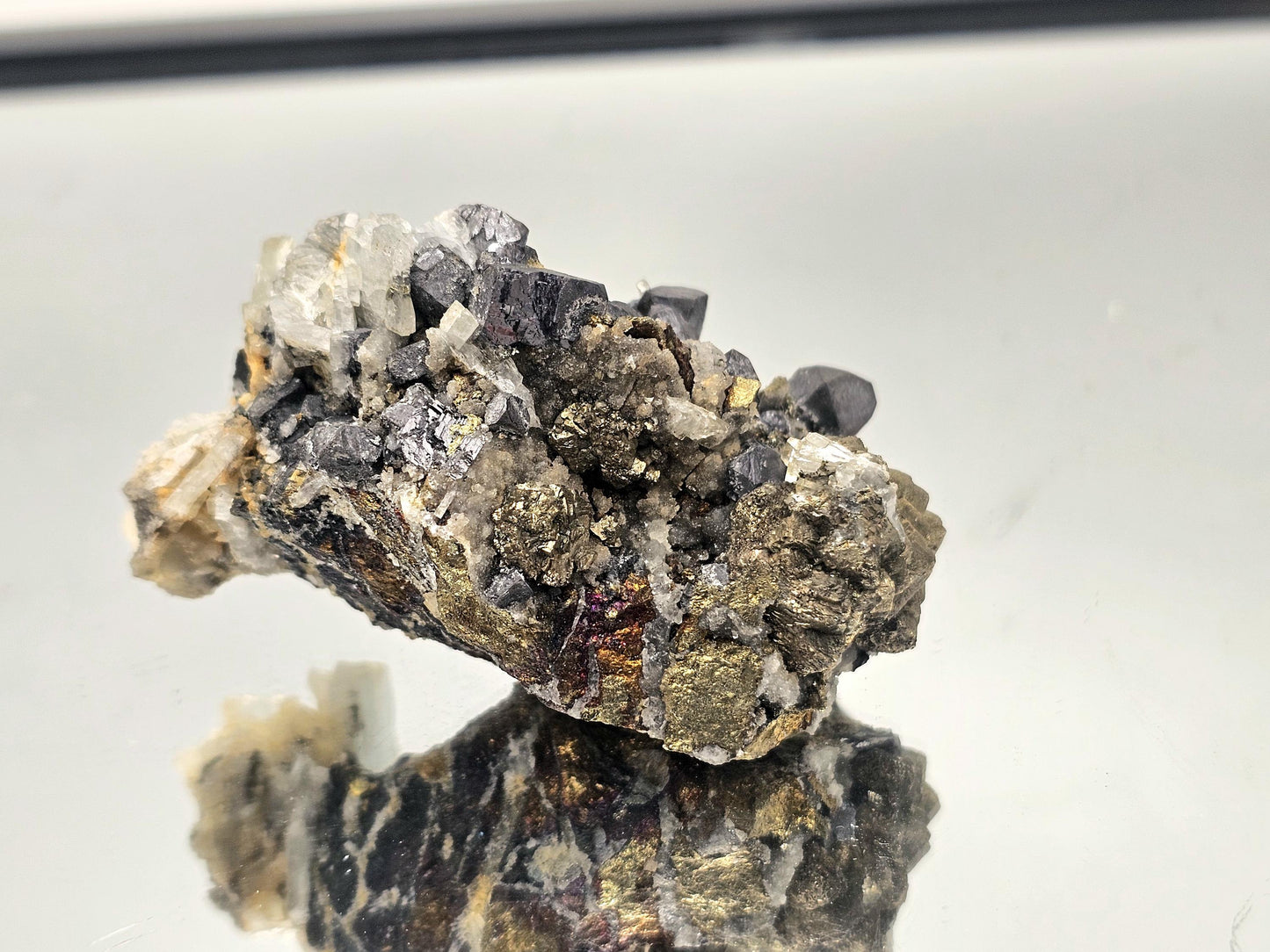 A stunning combination crystal featuring Blue Baryte, Galena, and Chalcopyrite, showcasing natural beauty and rarity from Morocco.