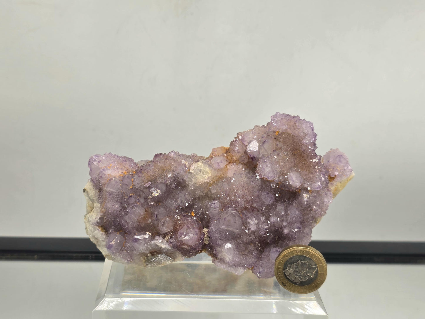 Natural purple Amethyst crystal cluster.