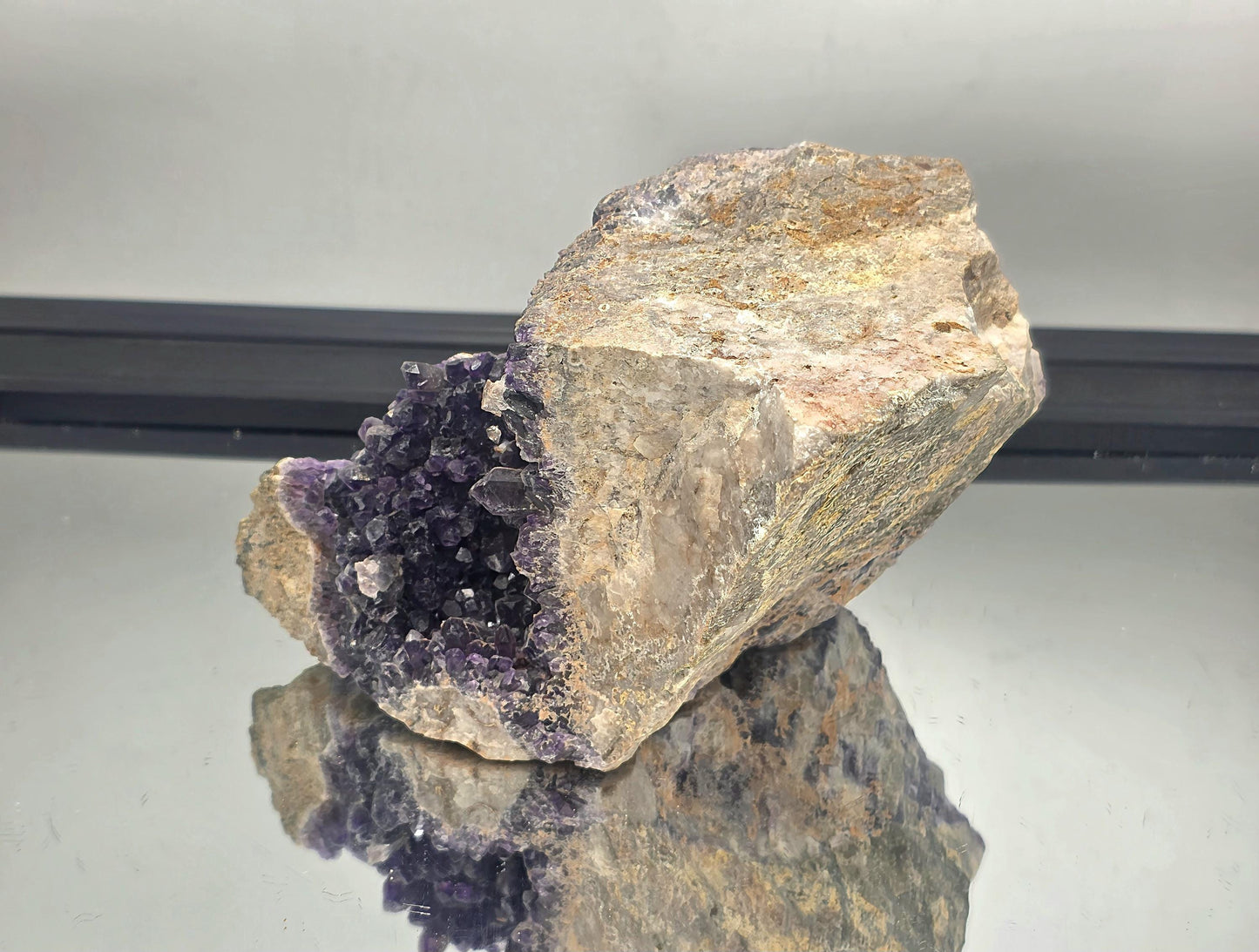 Natural Mapatizya amethyst cluster, dark purple crystal points.