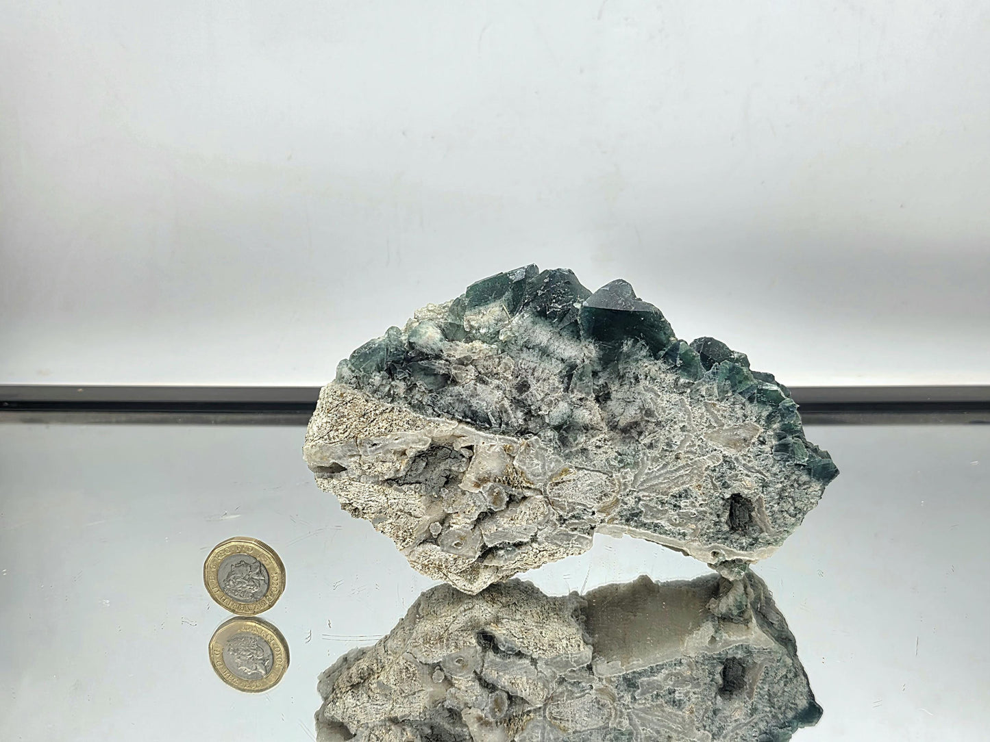 Natural Fluorite slice from Madagascar with vibrant zoning.