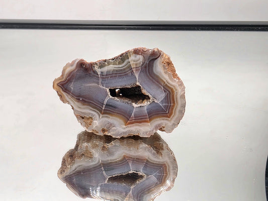 Natural Malawi Agate polished banded geode.