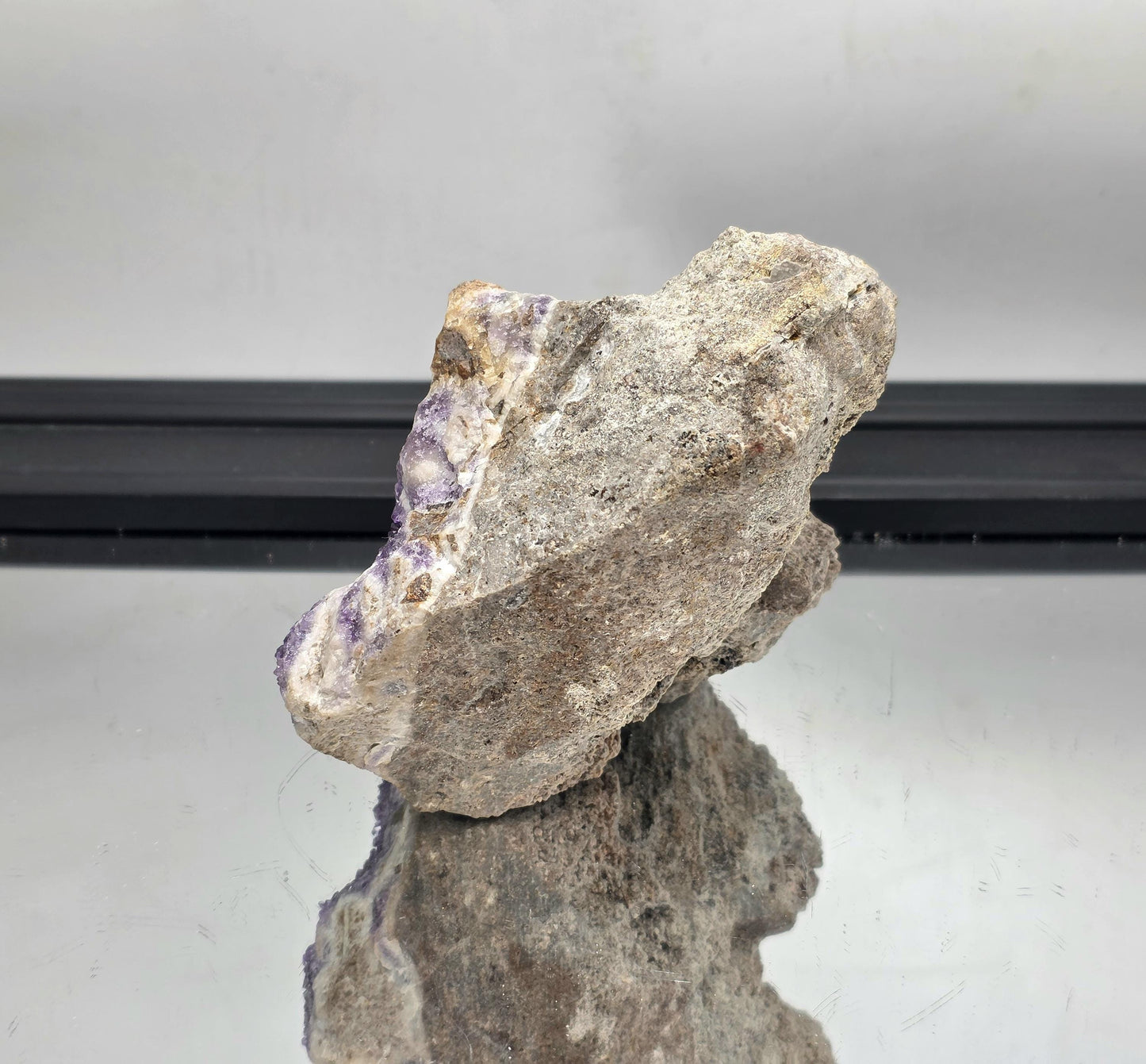 Natural Mapatizya amethyst cluster, dark purple crystals.