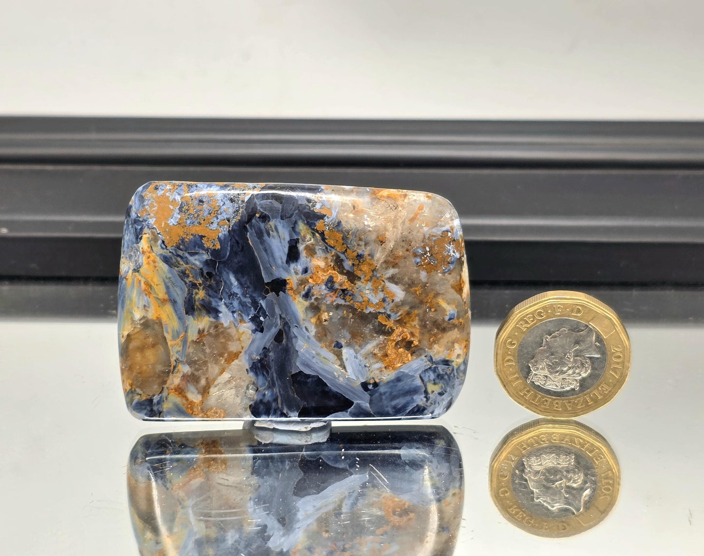 Natural Pietersite slice for display.
