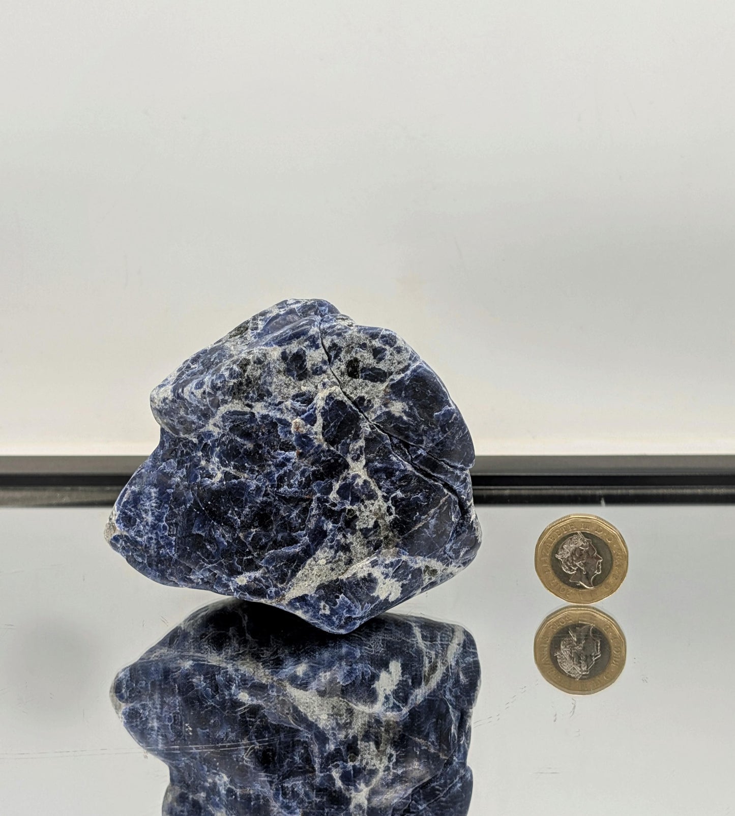 Natural Sodalite freeform with vibrant colour and raw detailing.