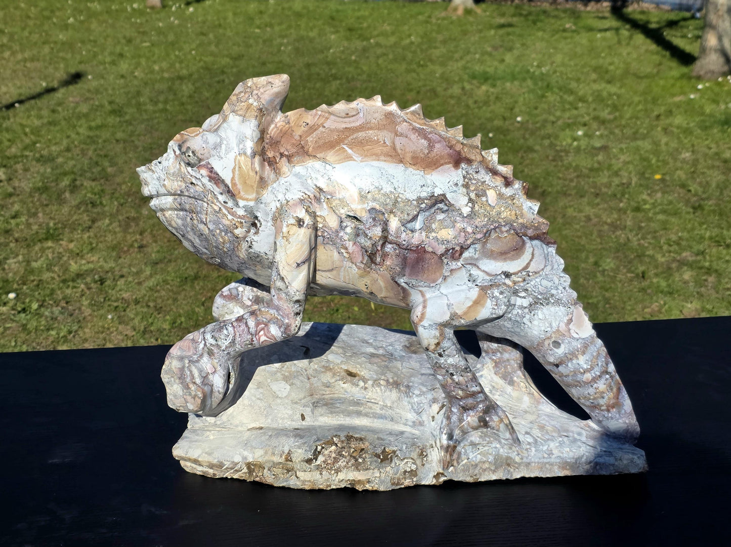 A rare, one-of-a-kind Jasper crystal carving for elite home displays.