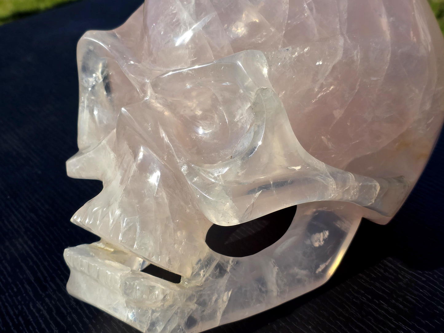 A one-of-a-kind Rose Quartz Skull carving.