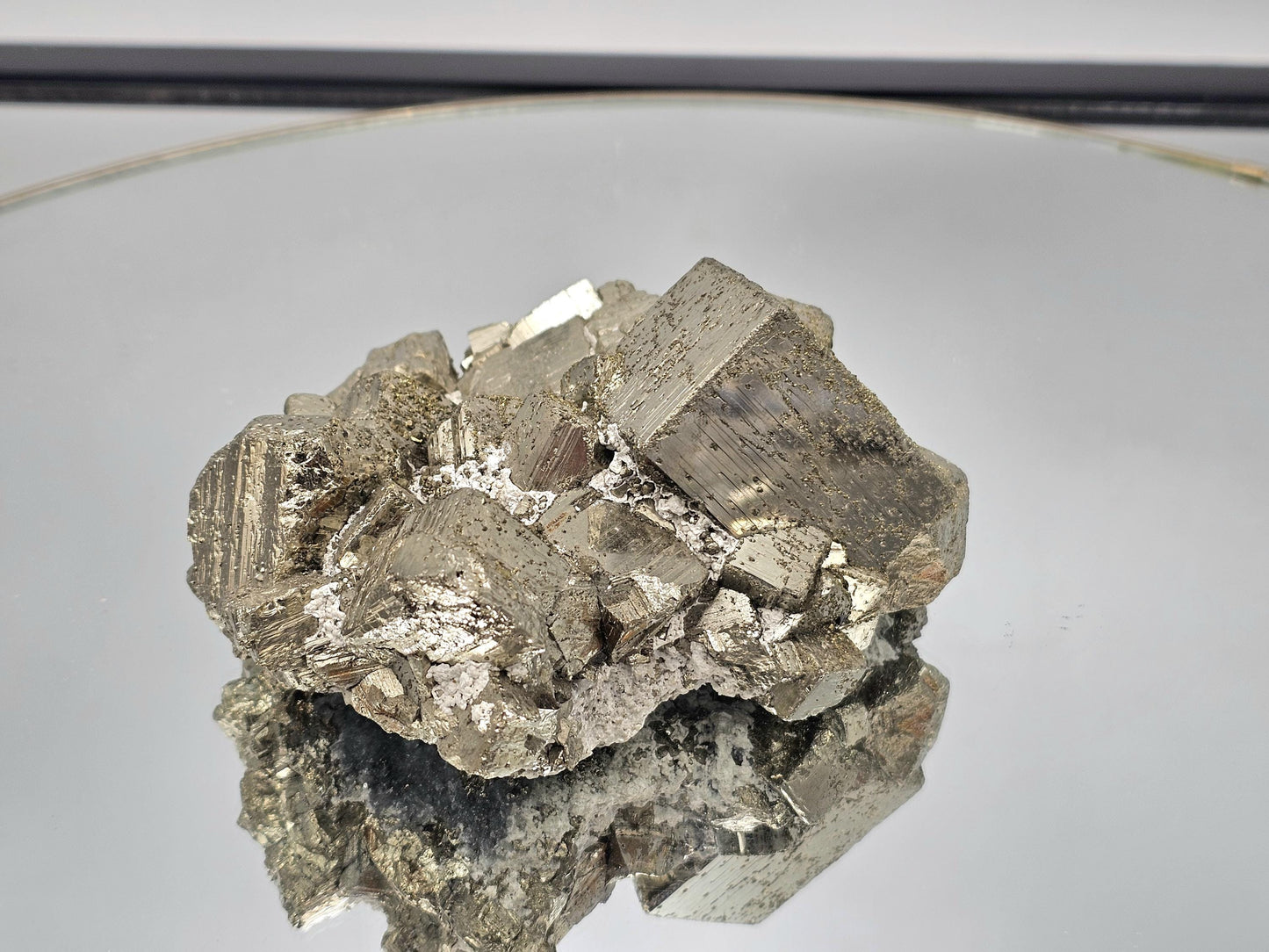 Large Peruvian Pyrite crystal piece with a rich golden metallic shine.