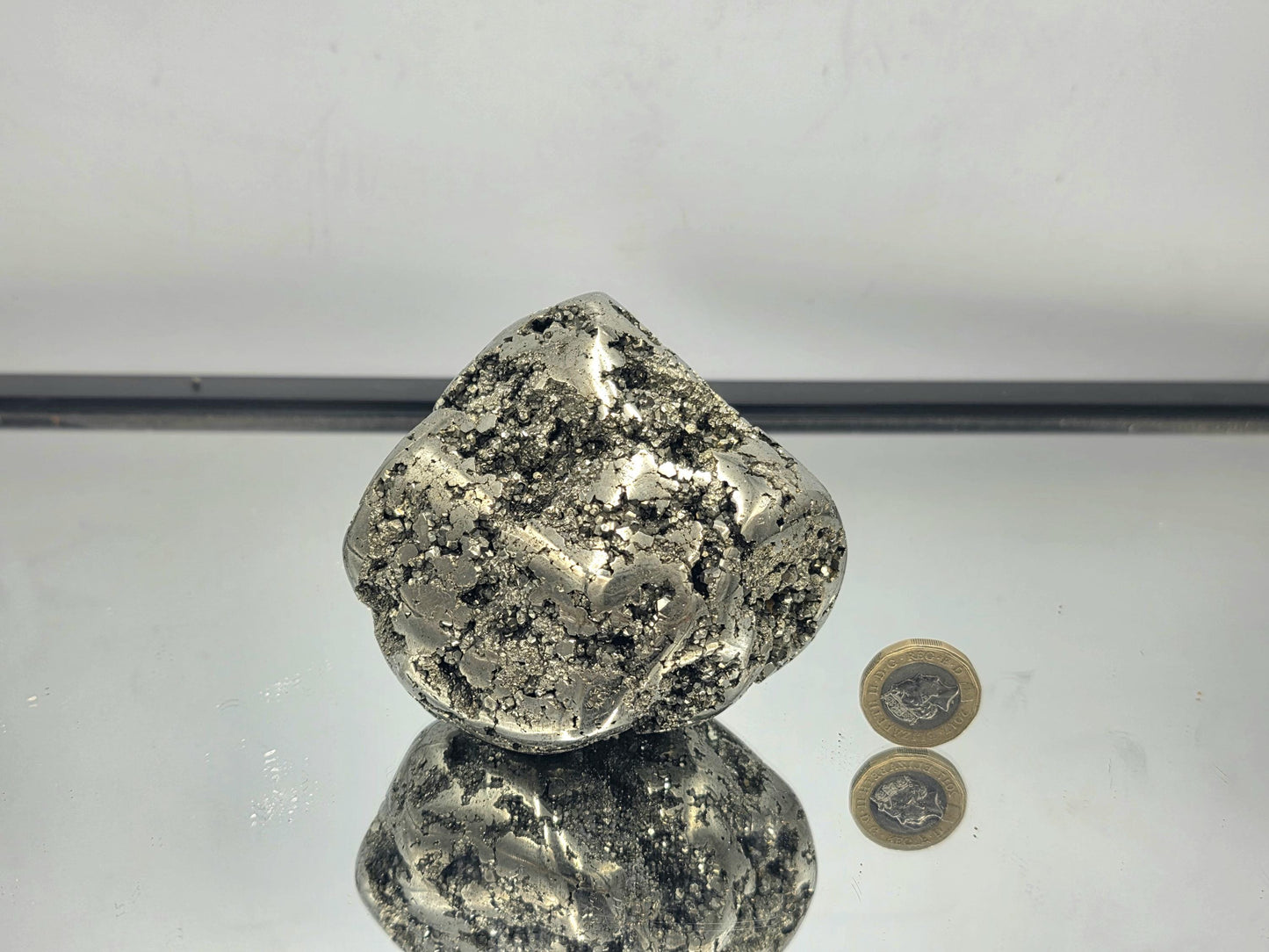 A Peruvian Pyrite geode, suited for modern interiors.