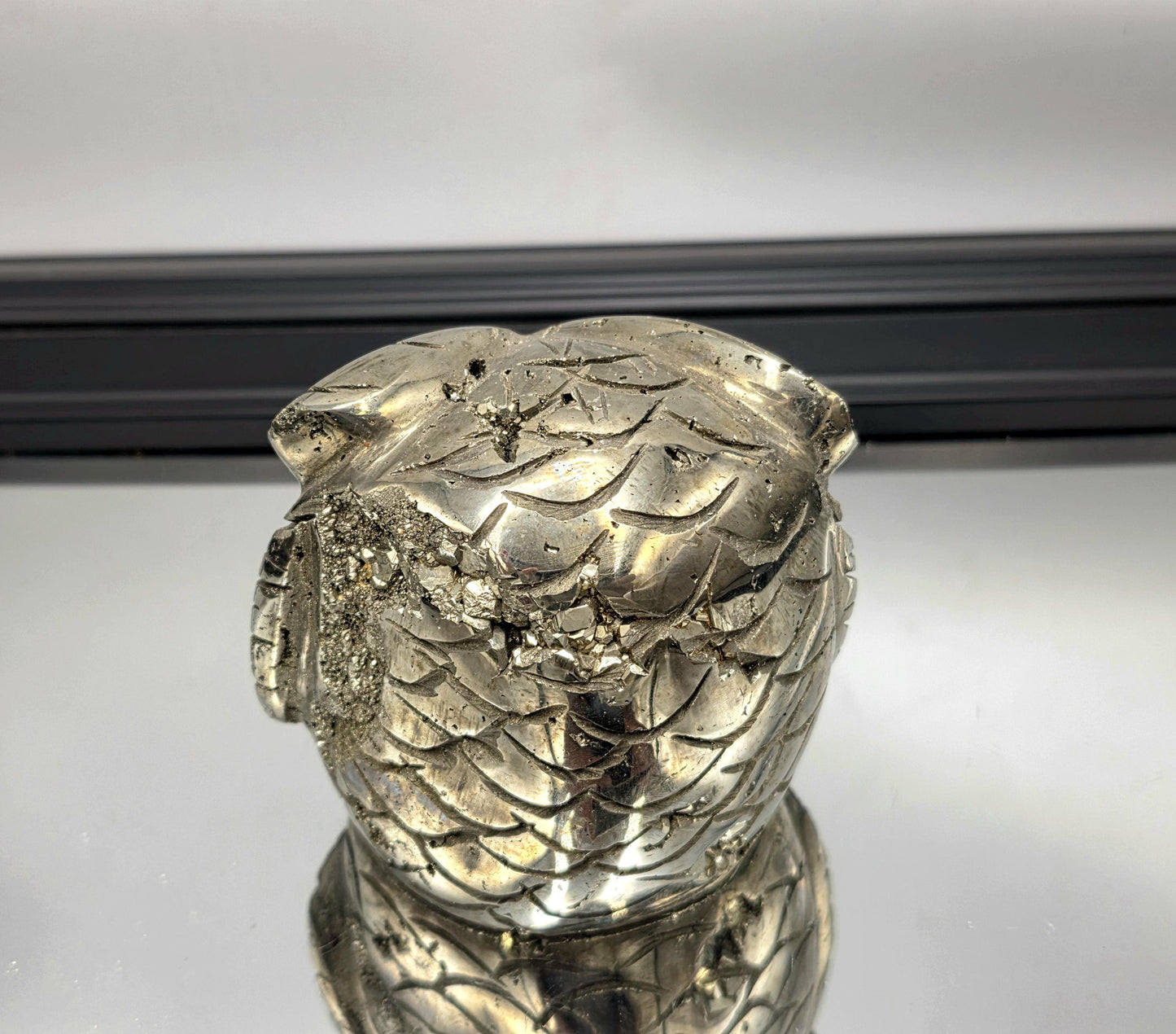 Artisan pyrite owl figure with metallic luster