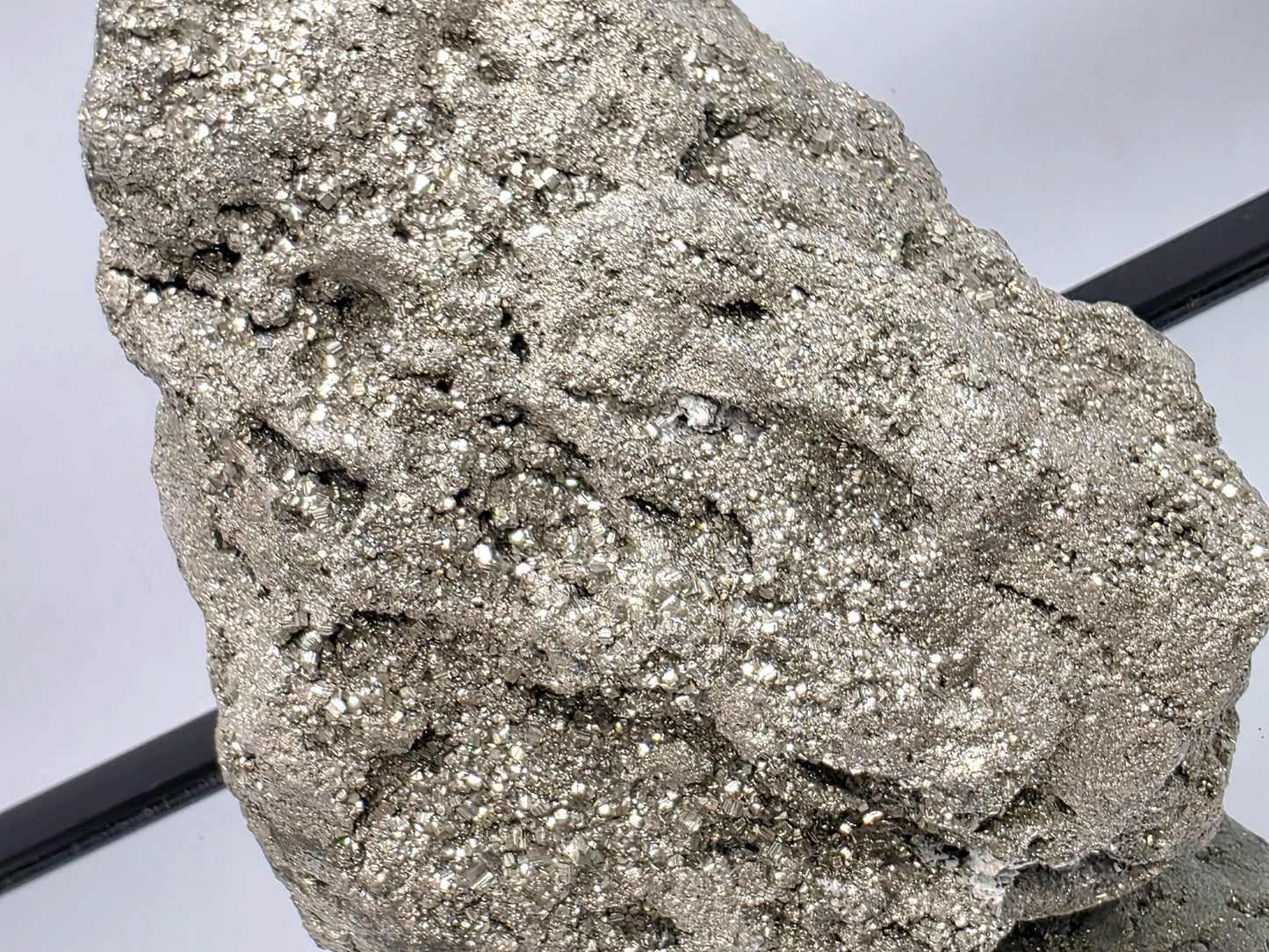 Large metallic Pyrite cluster crystal from Peru, raw edges.