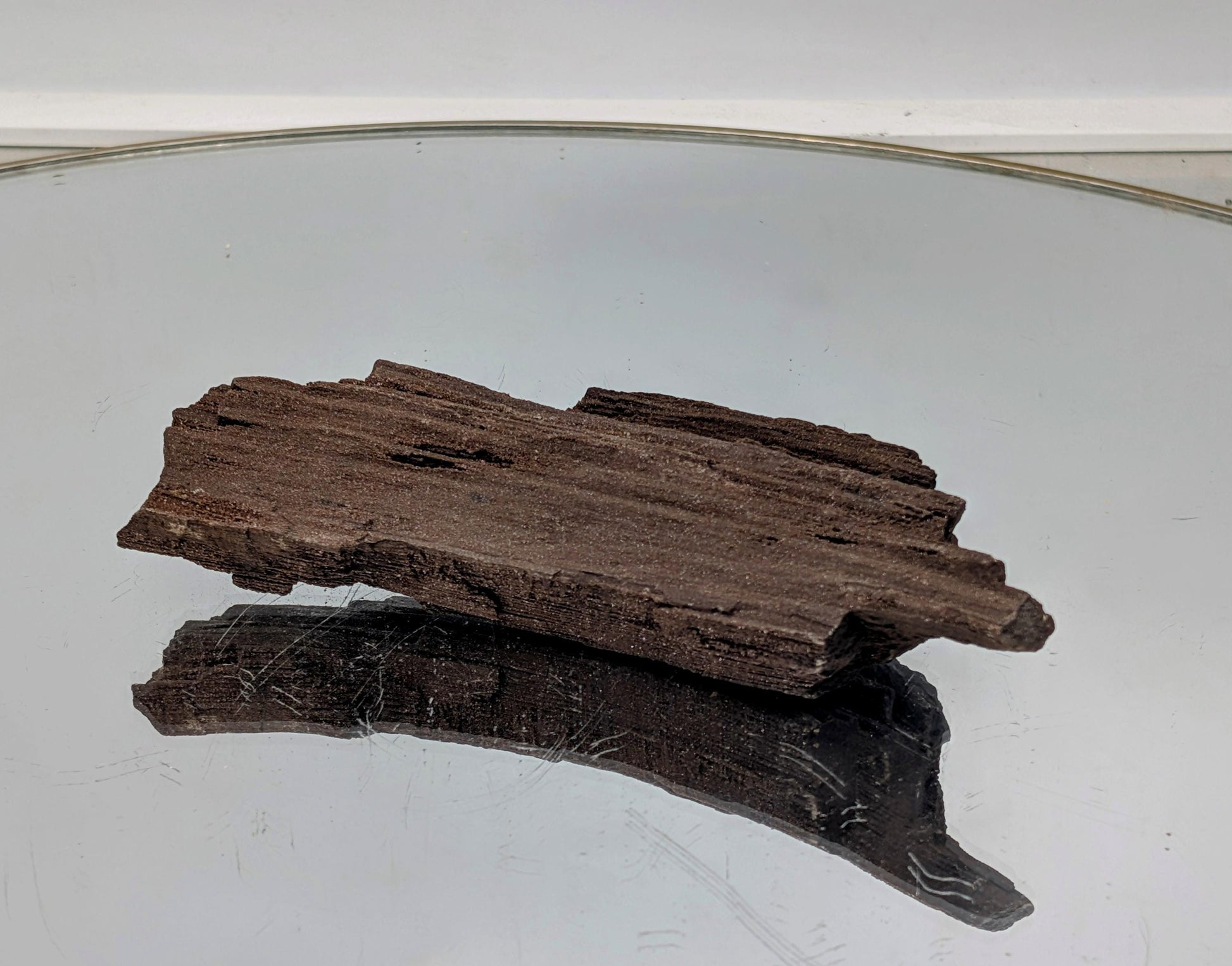 35-million-year-old petrified wood with quartz druzy from Germany.