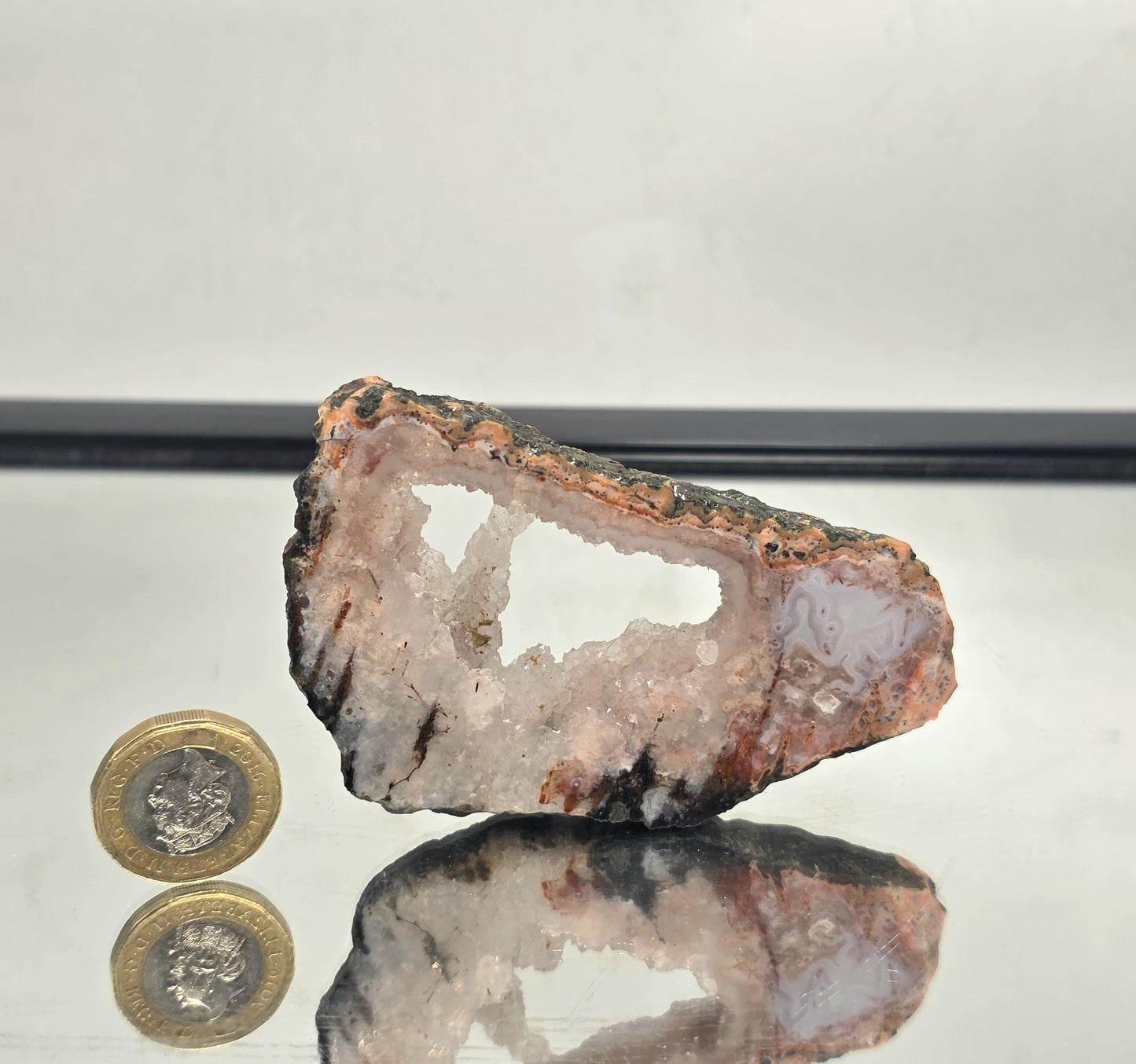 Moroccan Pink Agate slice crystal showing natural banding.