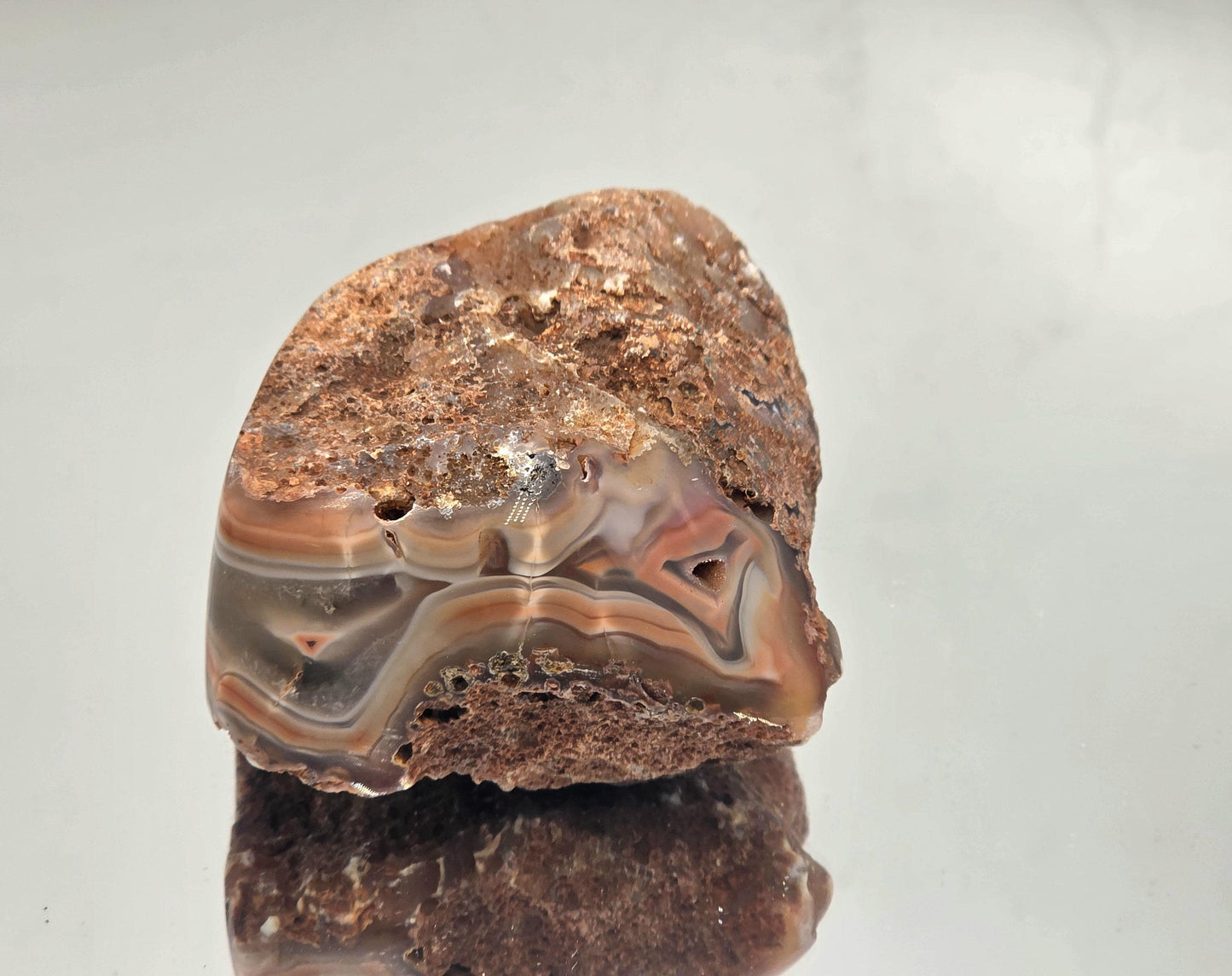 Polished high grade Malawi Agate crystal geode.