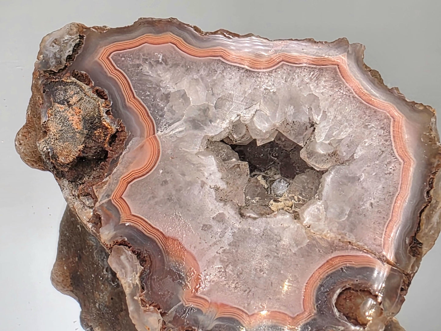 Polished crystal Malawi Agate geode pair display stones.