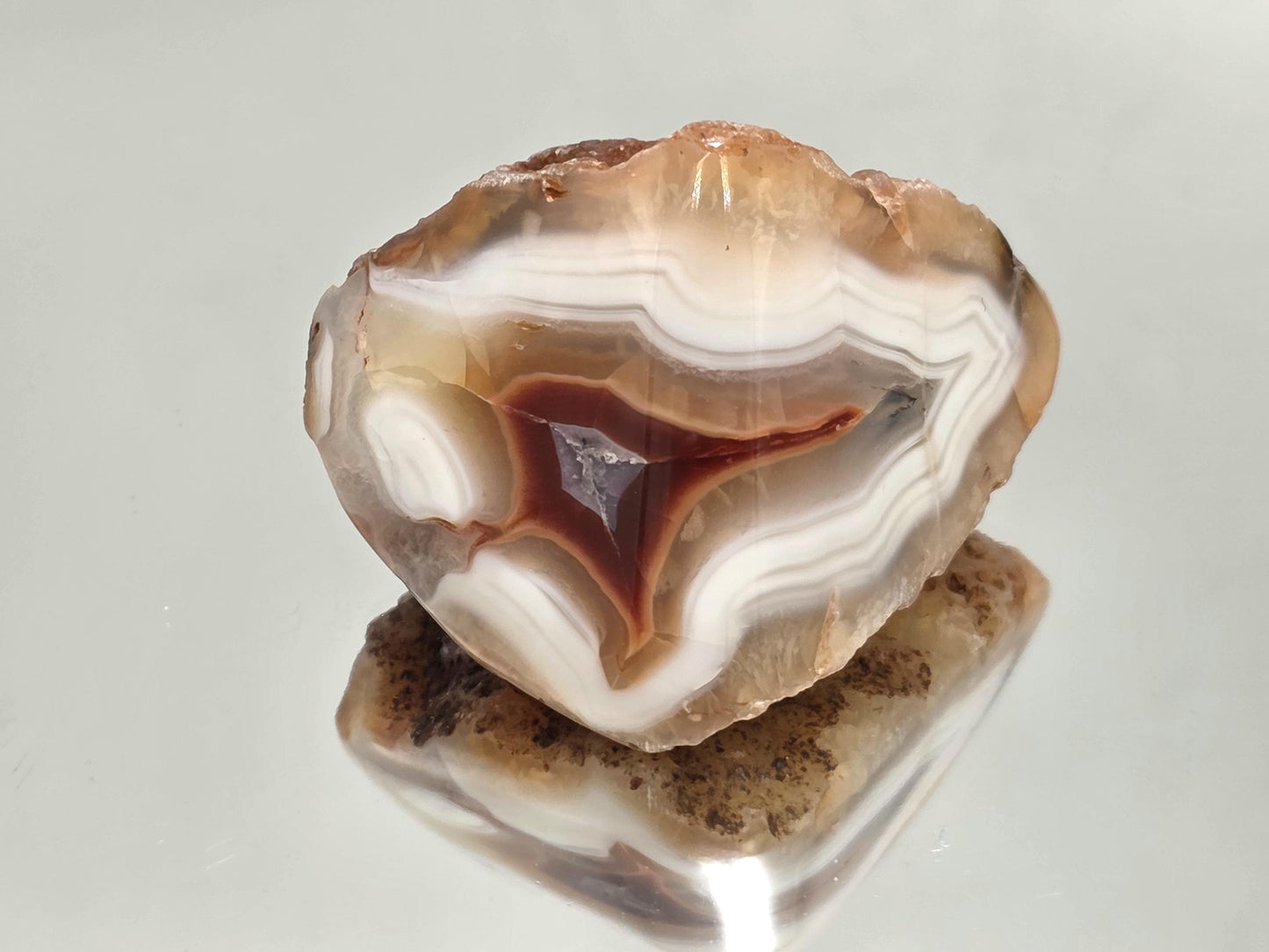 Polished vibrant Malawi Agate crystal geode.