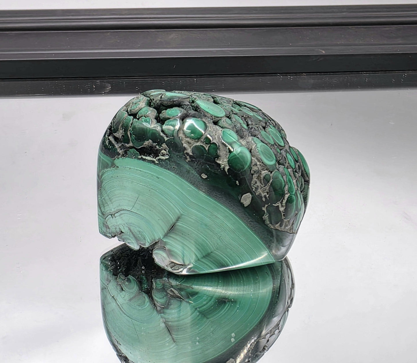 Polished edges reflecting soft lighting