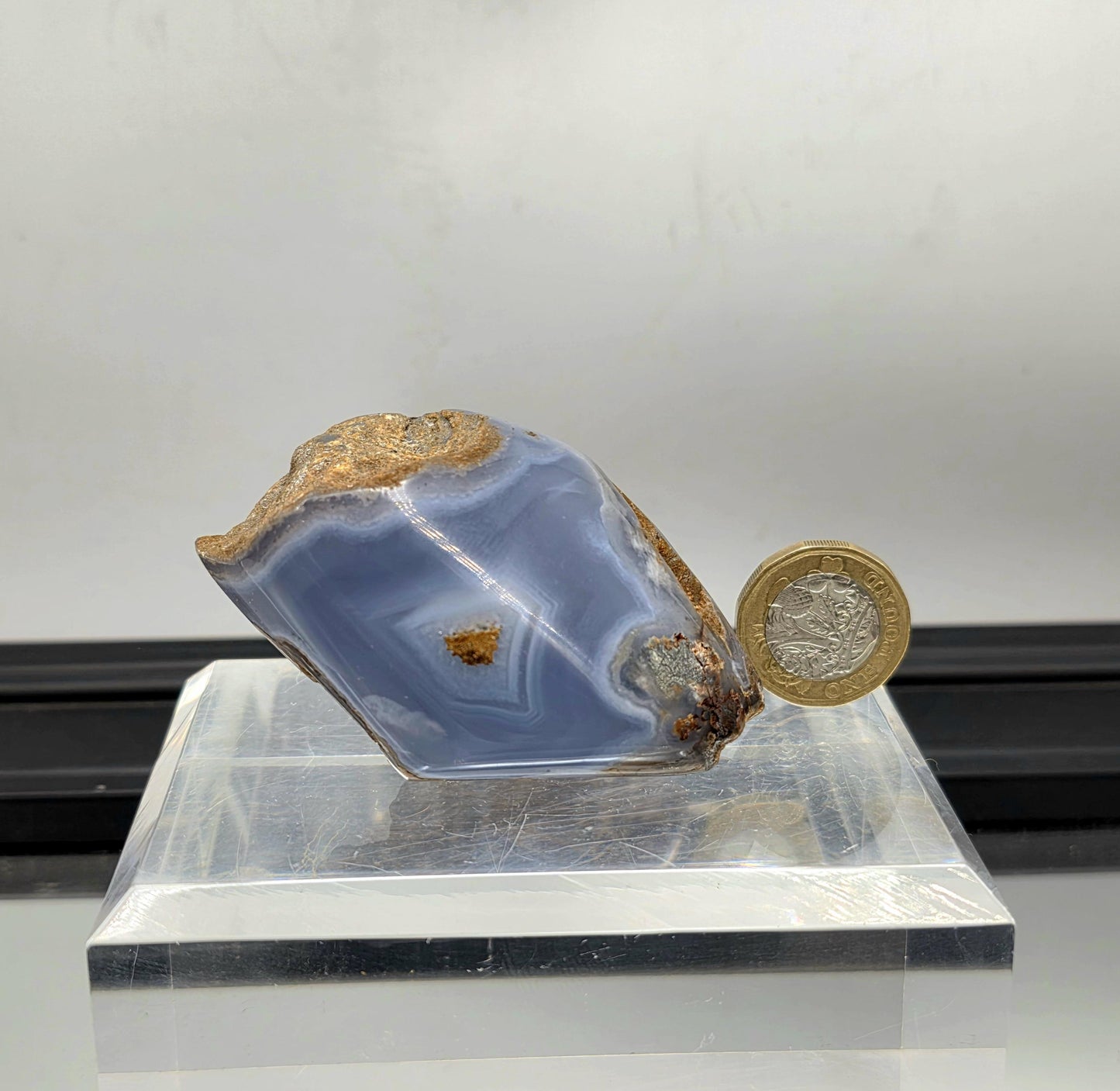 Polished gemstone of Blue Malawi Agate with bold contrast