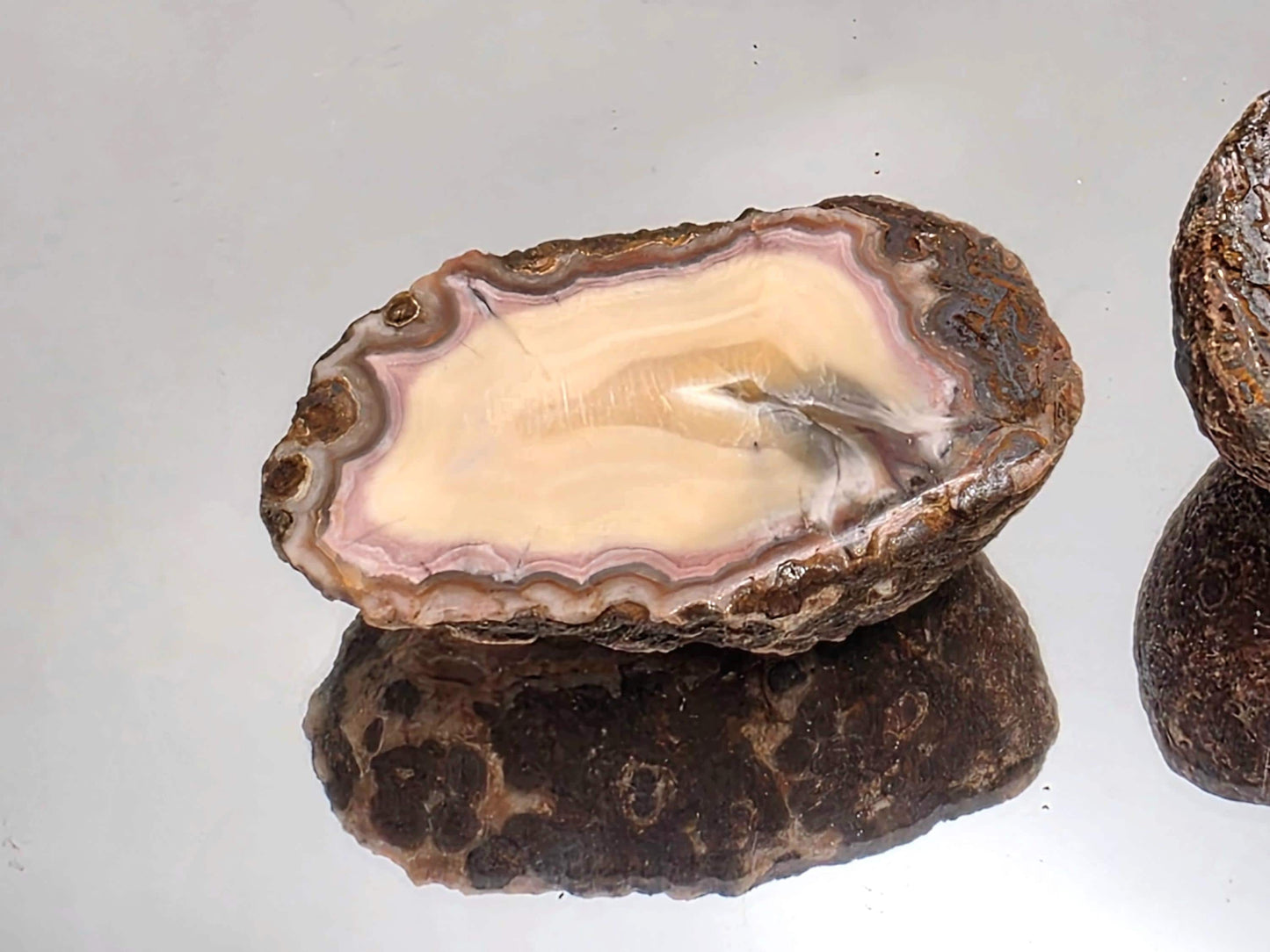 Polished Malawi Agate matching geode pair.
