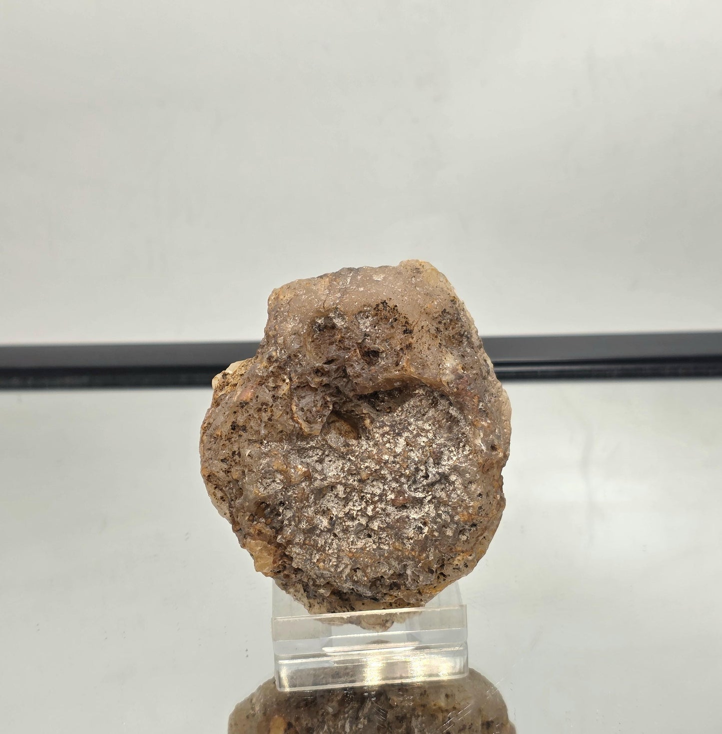 Polished Mexican Agate Geode featuring unique natural patterns.