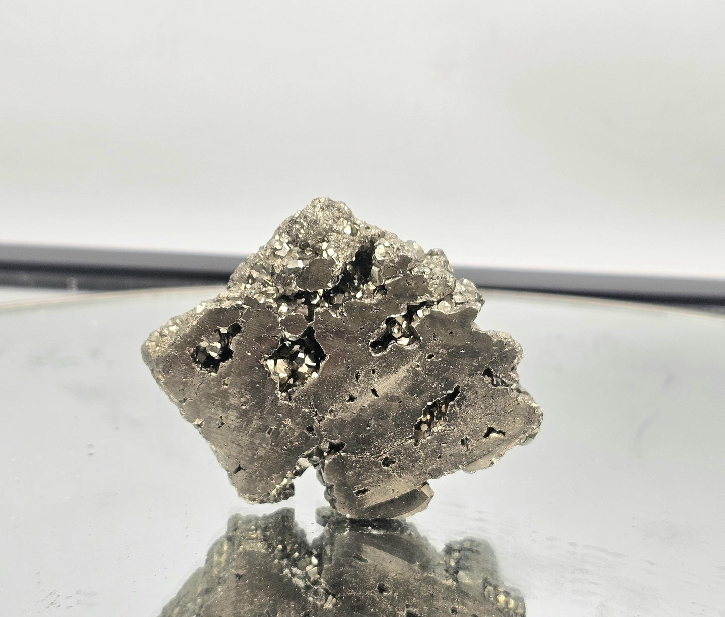 Beautiful polished Pyrite crystal slice with raw edging.