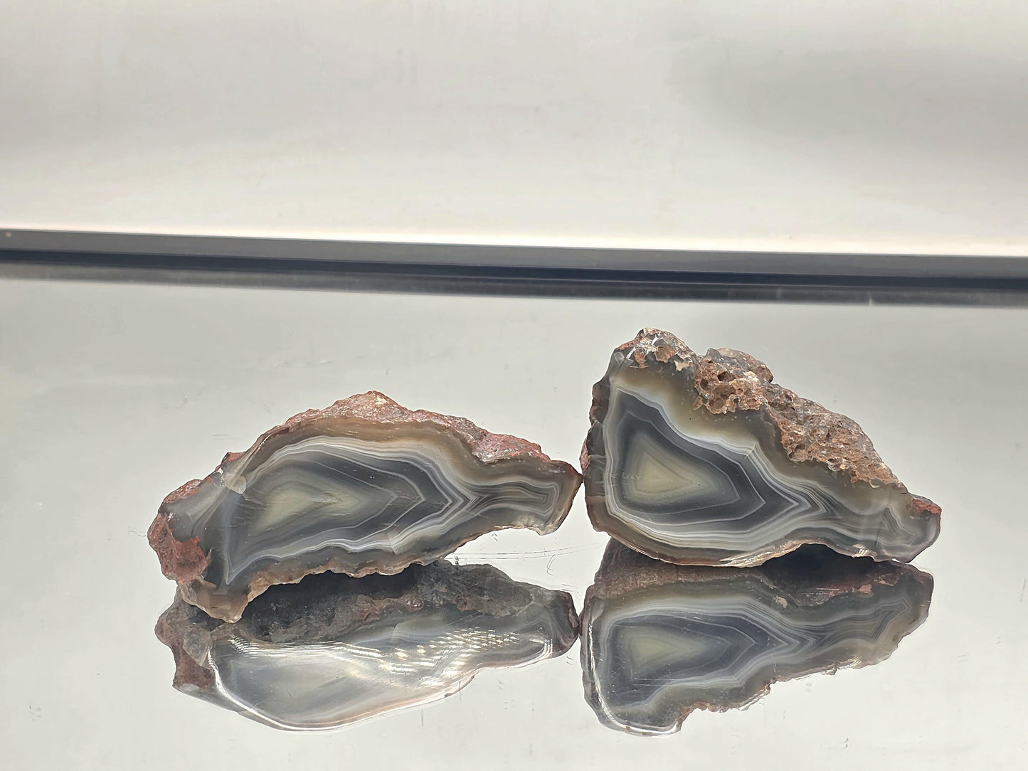 Premium natural banded agate pair with polished surfaces
