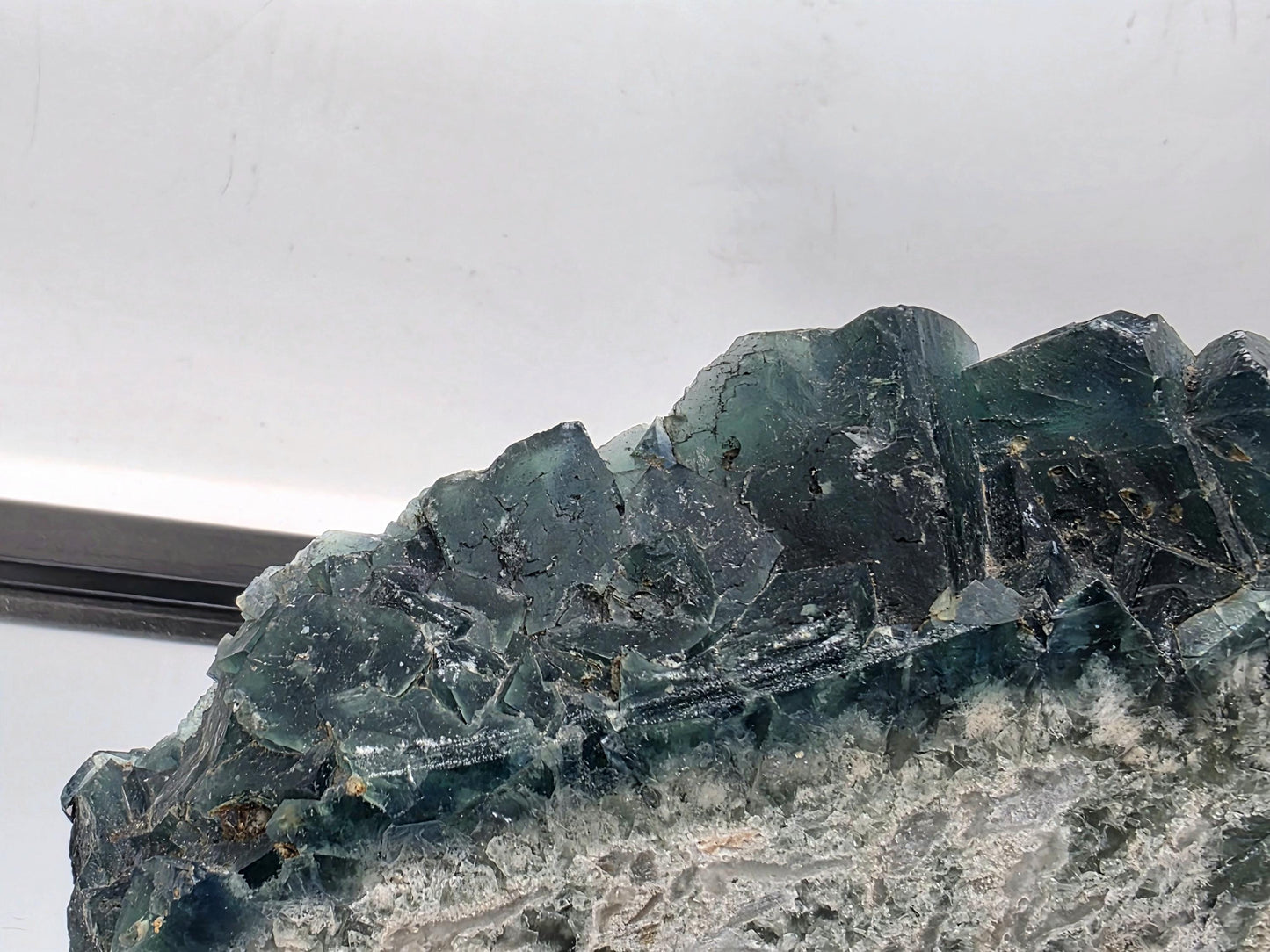 Premium Fluorite crystal slice from Madagascar with bold colors.