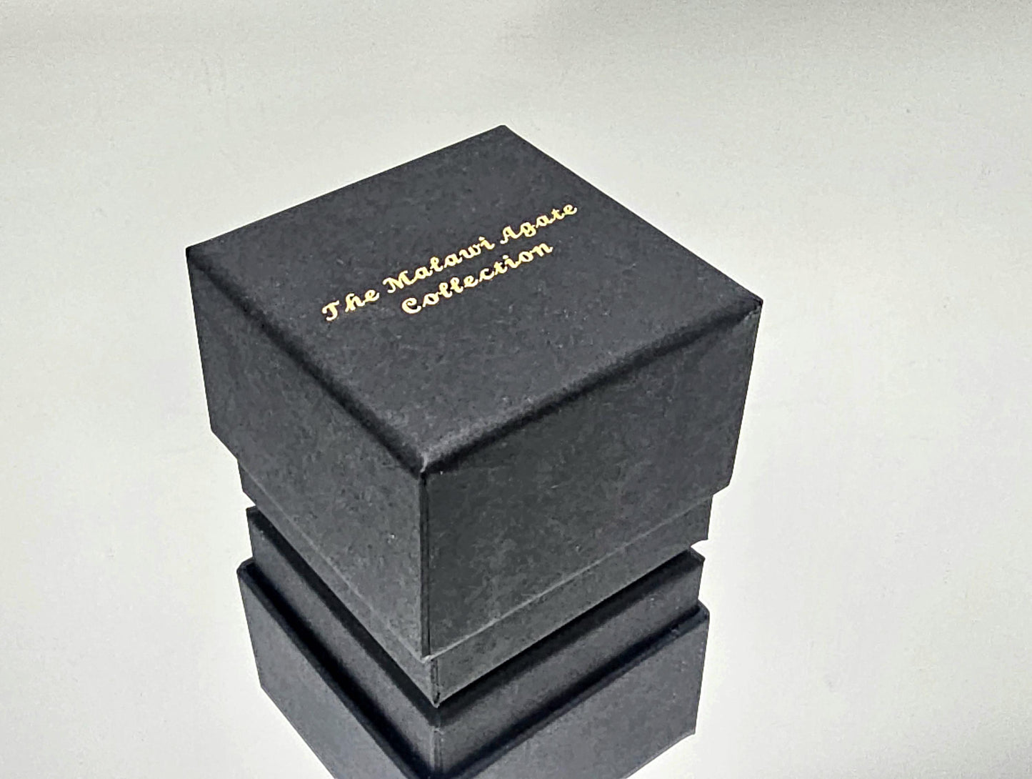 Rare Malawi agate crystal, polished and presented in a premium collector’s box.
