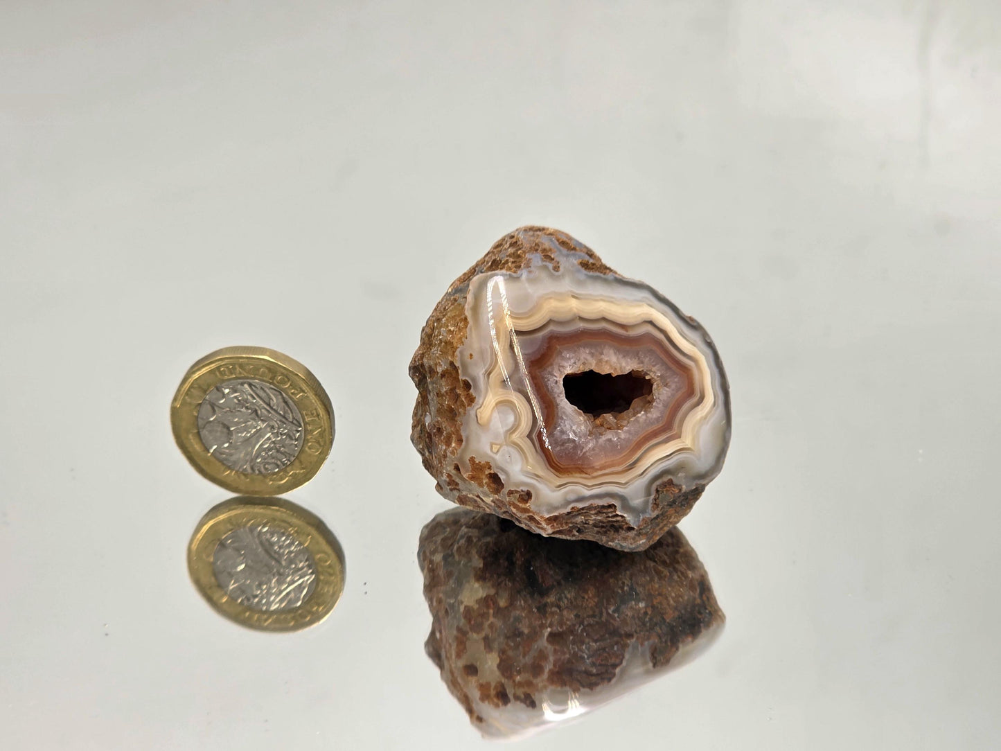 Rare polished Malawi Agate geode crystal specimen.