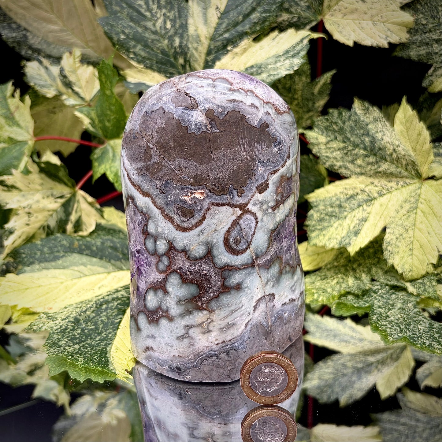 Reverse side of an Uruguayan amethyst crystal freeform showing the matrix and mineral formation.
