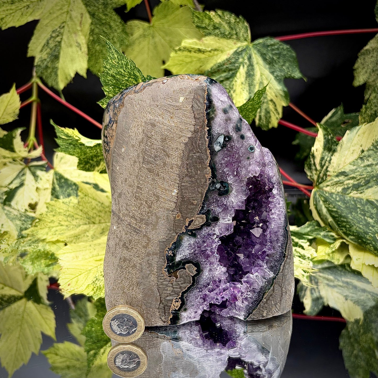 Reverse side of a Uruguayan amethyst crystal freeform showing the matrix and mineral formation.