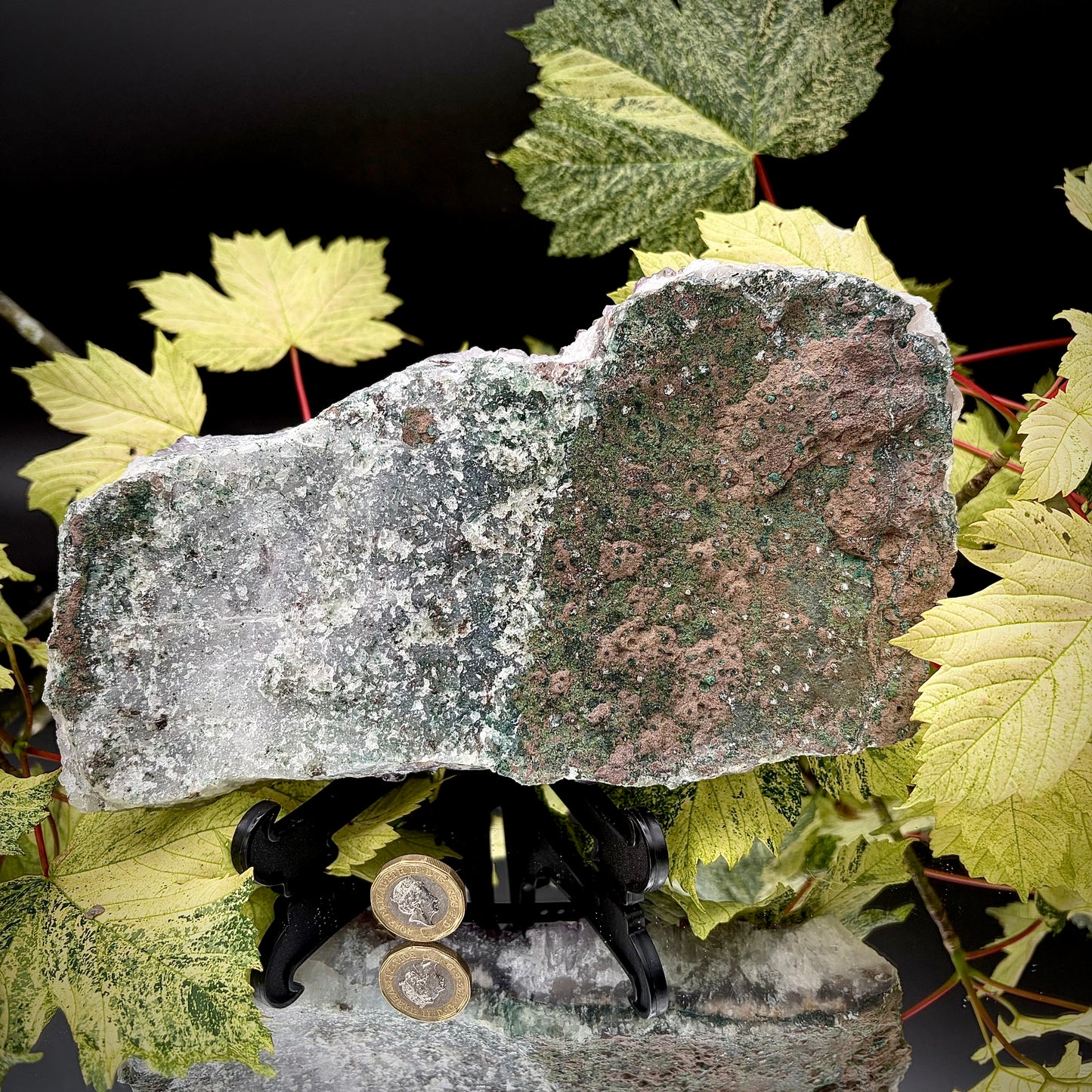 Reverse side of a natural amethyst crystal cluster showing the matrix and mineral formation.