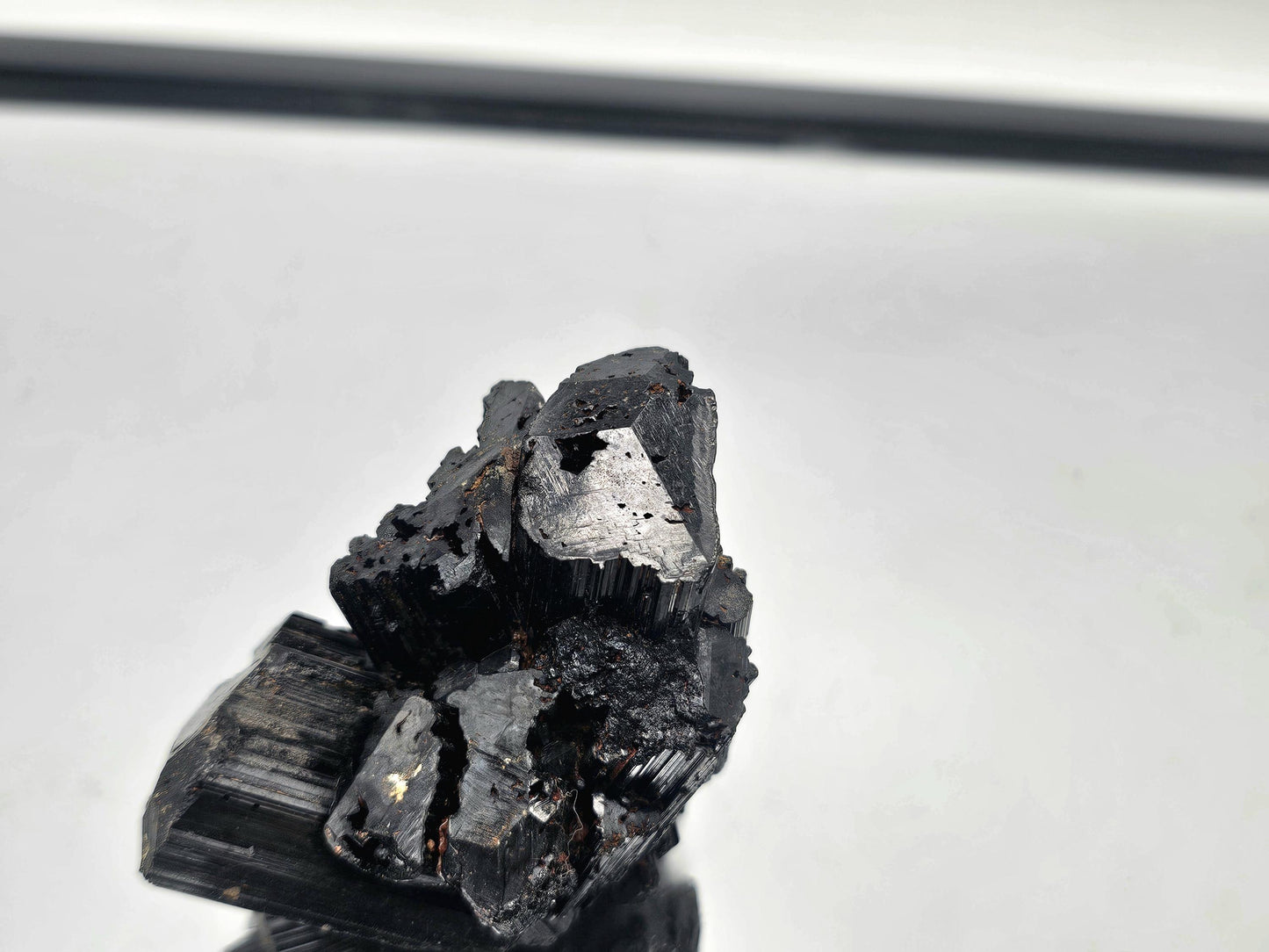 Black Tourmaline crystal with distinct natural terminations, adding raw beauty to any collection.