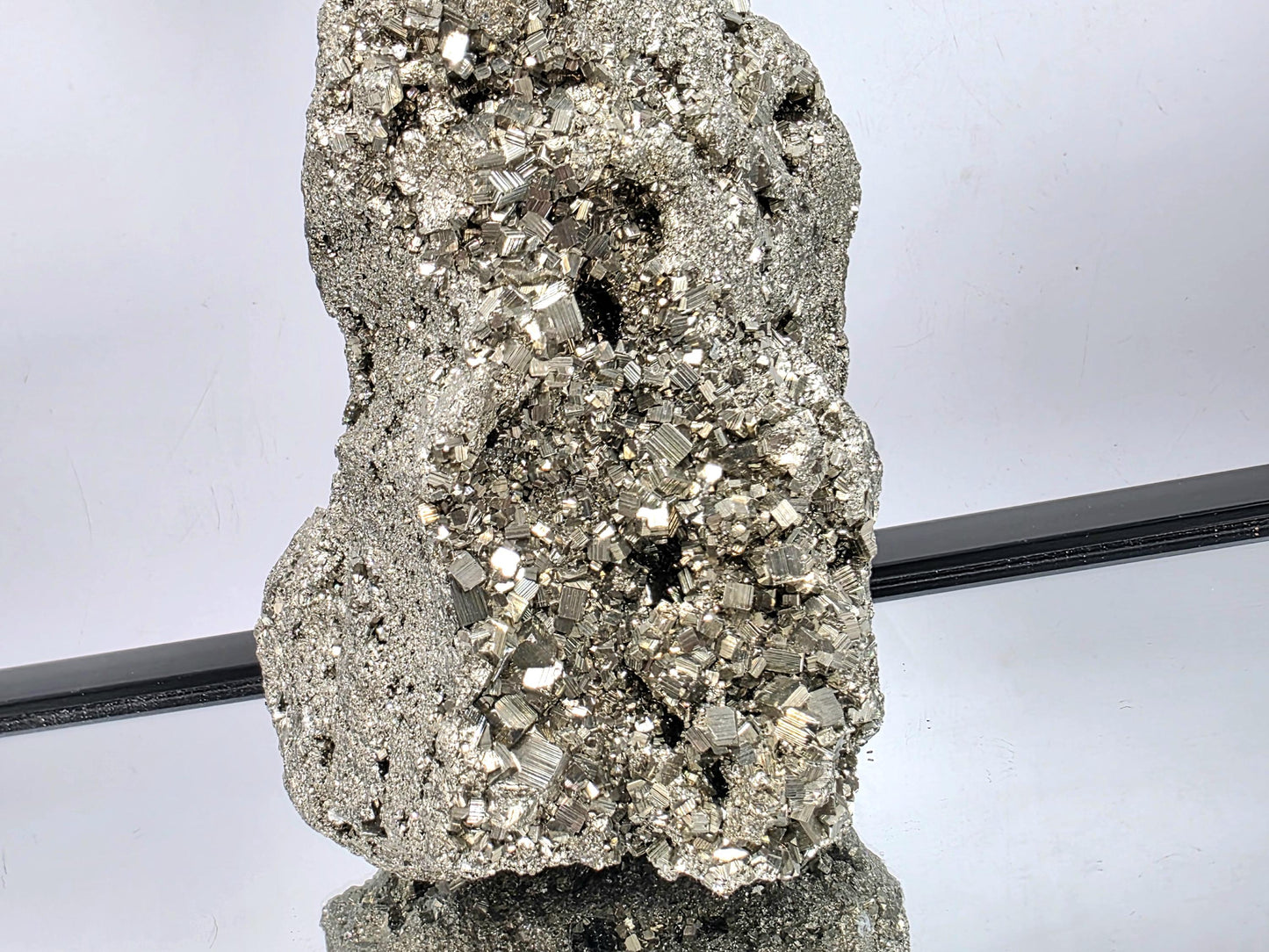 Sparkling very large Pyrite cluster with golden tones.