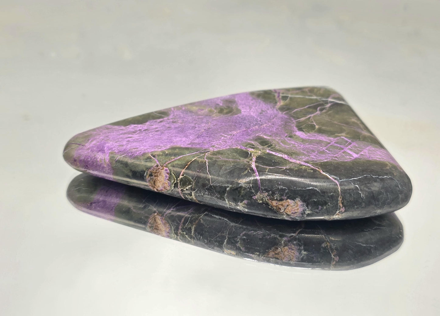 Crystal palmstone featuring green serpentine and purple stichtite.