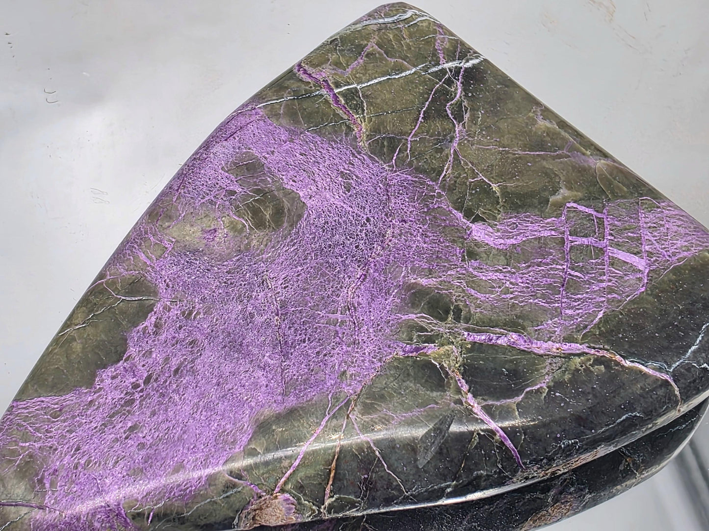 Large palmstone highlighting stichtite and serpentine swirls.