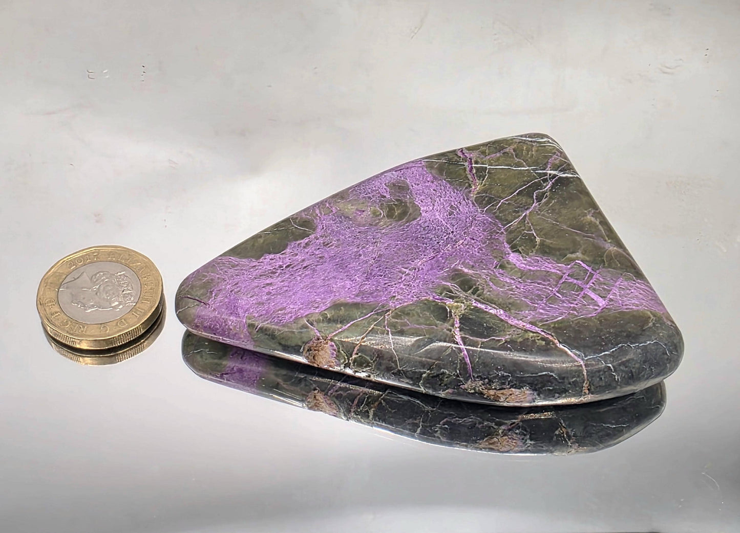 Crystal palmstone with natural stichtite and serpentine blend.