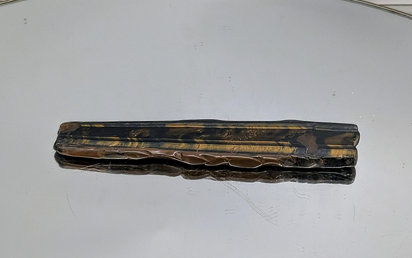 Decorative Tiger’s Eye crystal slice ideal for display