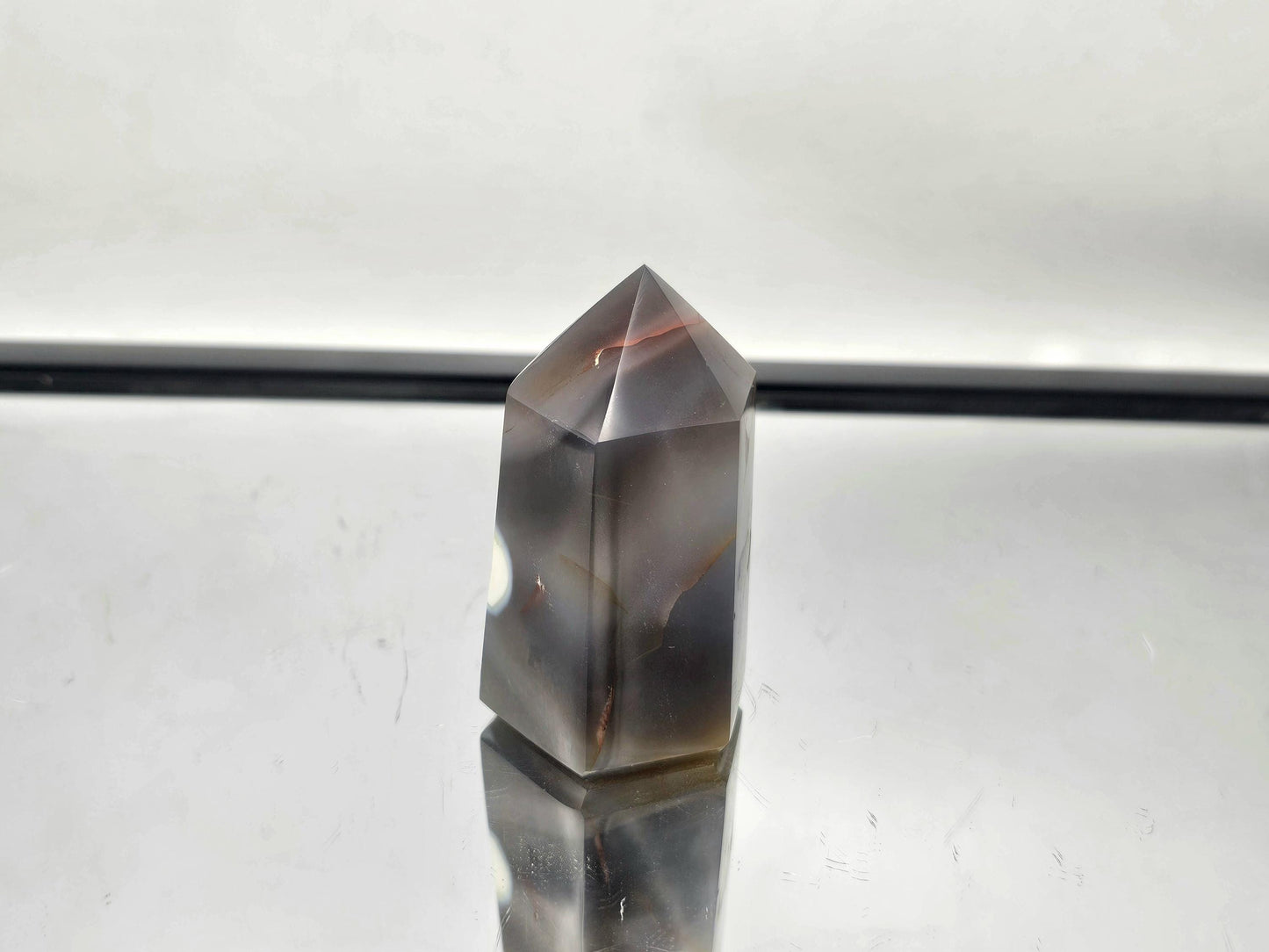 Unique Orca Agate crystal tower for modern home decor.
