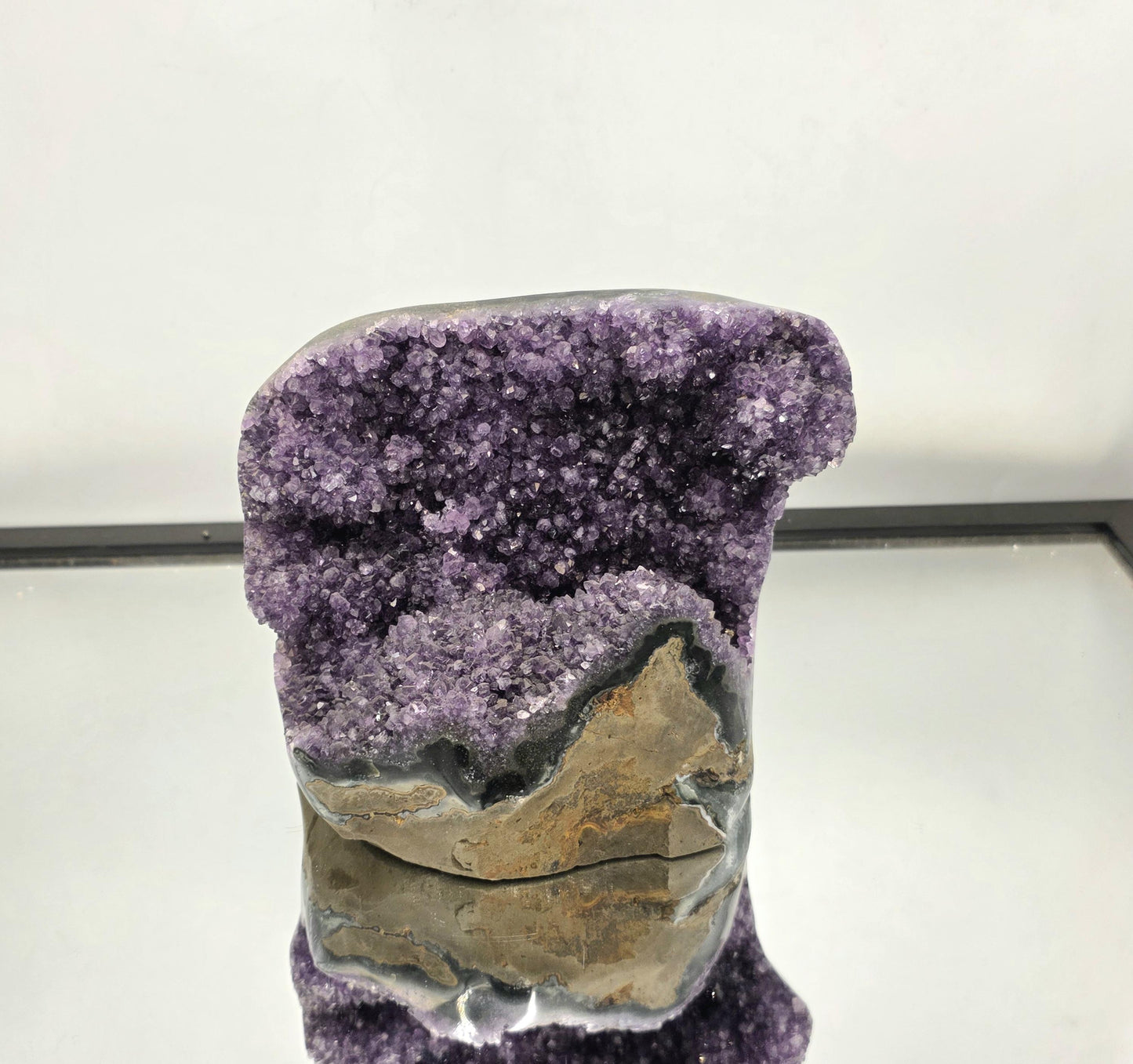 A premium Uruguayan Amethyst geode with polished sides.