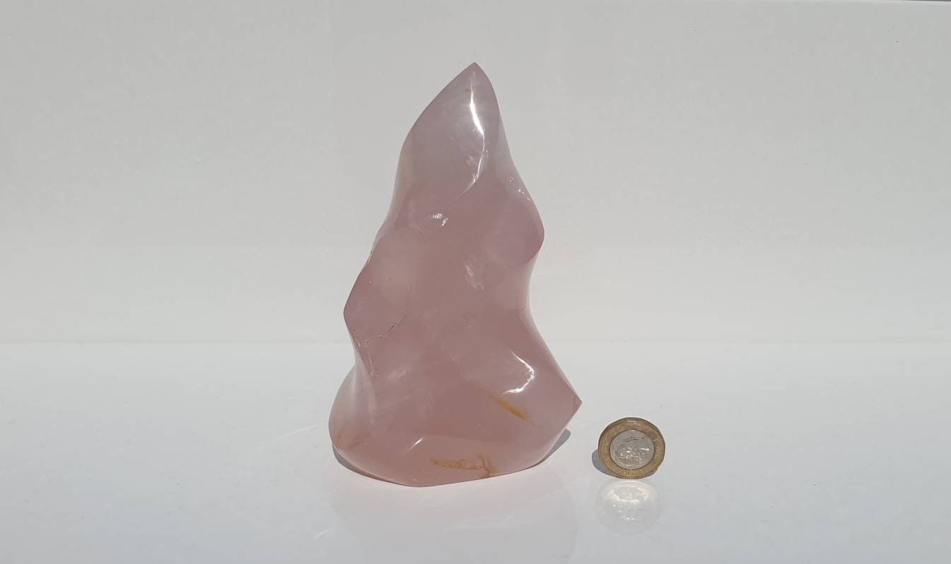 9) Rose Quartz Crystal Flame